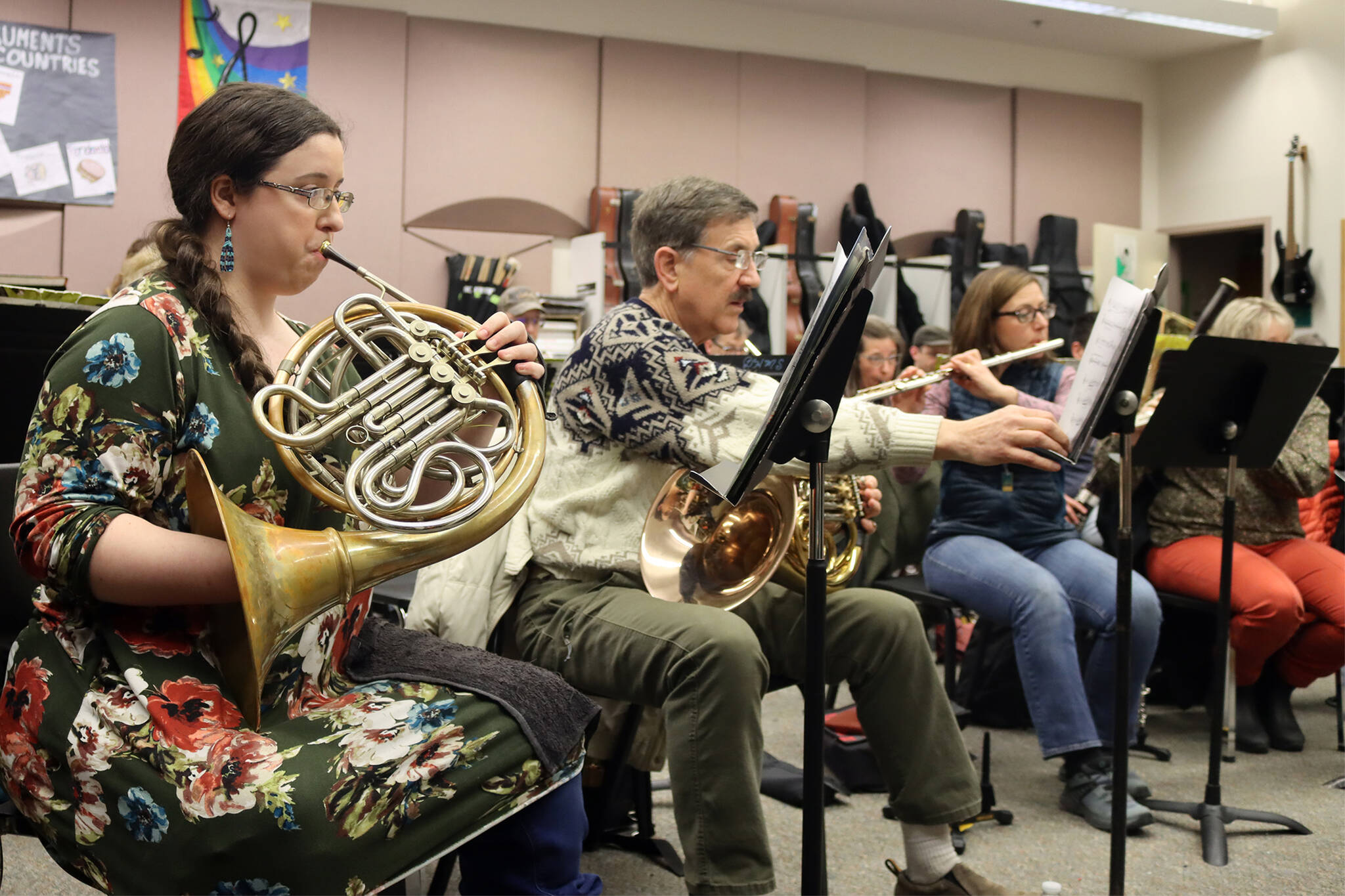 Kristine Paulick and Bill Paulick rehearse in a music classroom in Dzantik’i Heeni Middle School ahead of an upcoming Juneau Community Bands Horns A-Plenty concert set for Sunday at Thunder Mountain High School. (Ben Hohenstatt / Juneau Empire)
