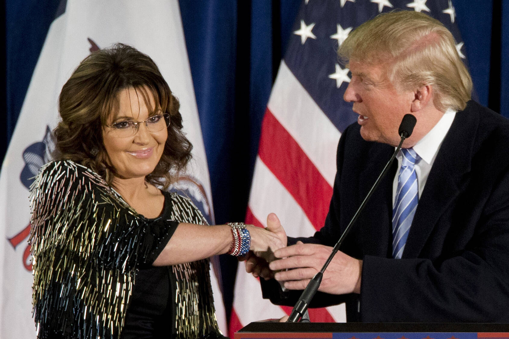 Former Alaska Gov. Sarah Palin, left, appears with then-Republican presidential candidate Donald Trump at a rally at the Iowa State University on Jan. 19, 2016, in Ames, Iowa. Former Alaska Gov. Sarah Palin has picked up a prized endorsement in her bid in an extremely crowded field to fill the unexpired term of the late U.S. Rep. Don Young. Former President Donald Trump backed Palin on Sunday, April 3, 2022, in a statement from his political action committee. (AP Photo / Mary Altaffer)