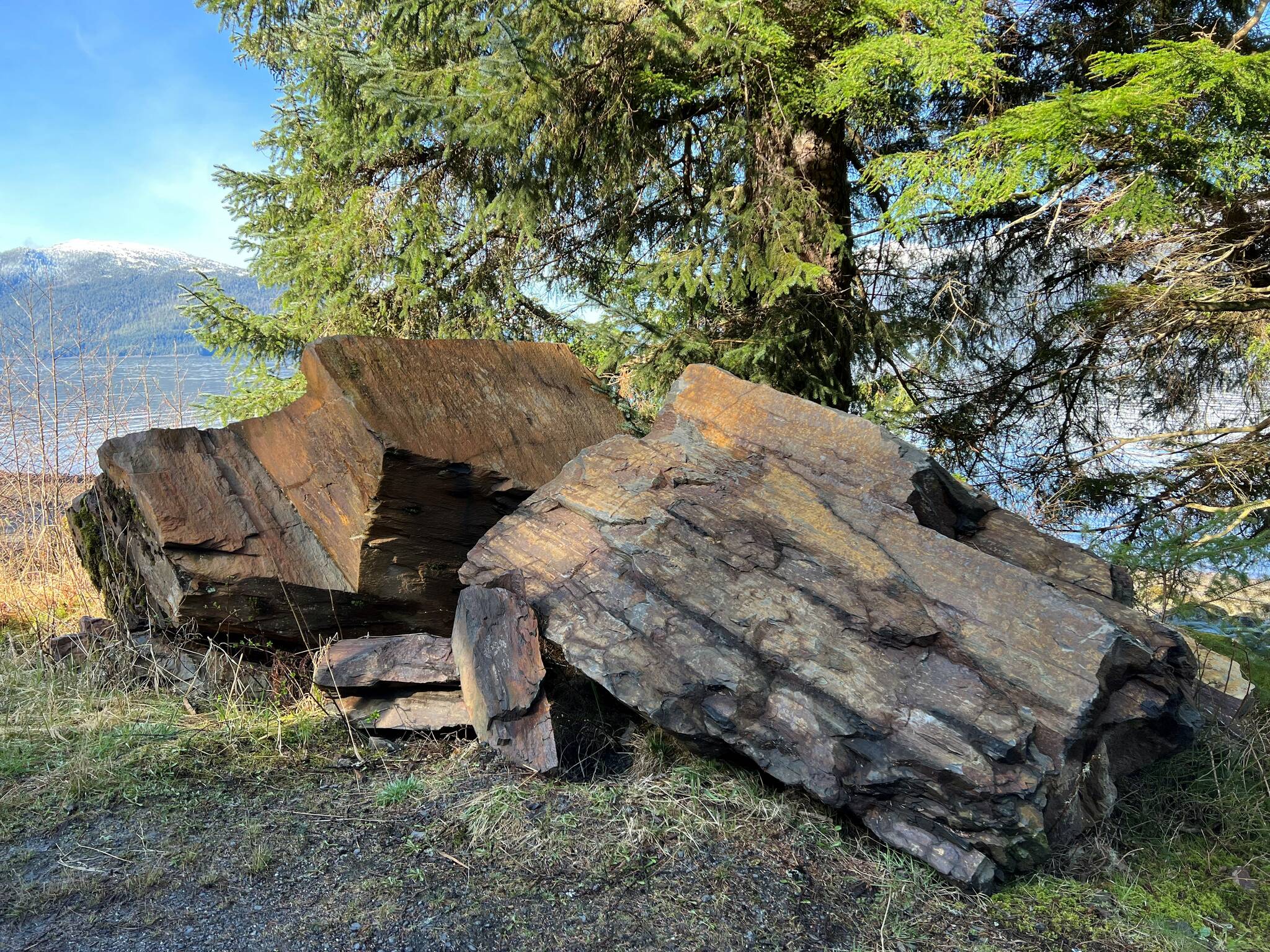 Car-sized boulders from a spring landslide on Zimovia Highway bluffs in Wrangell. (Vivian Faith Prescott / For the Capital City Weekly)