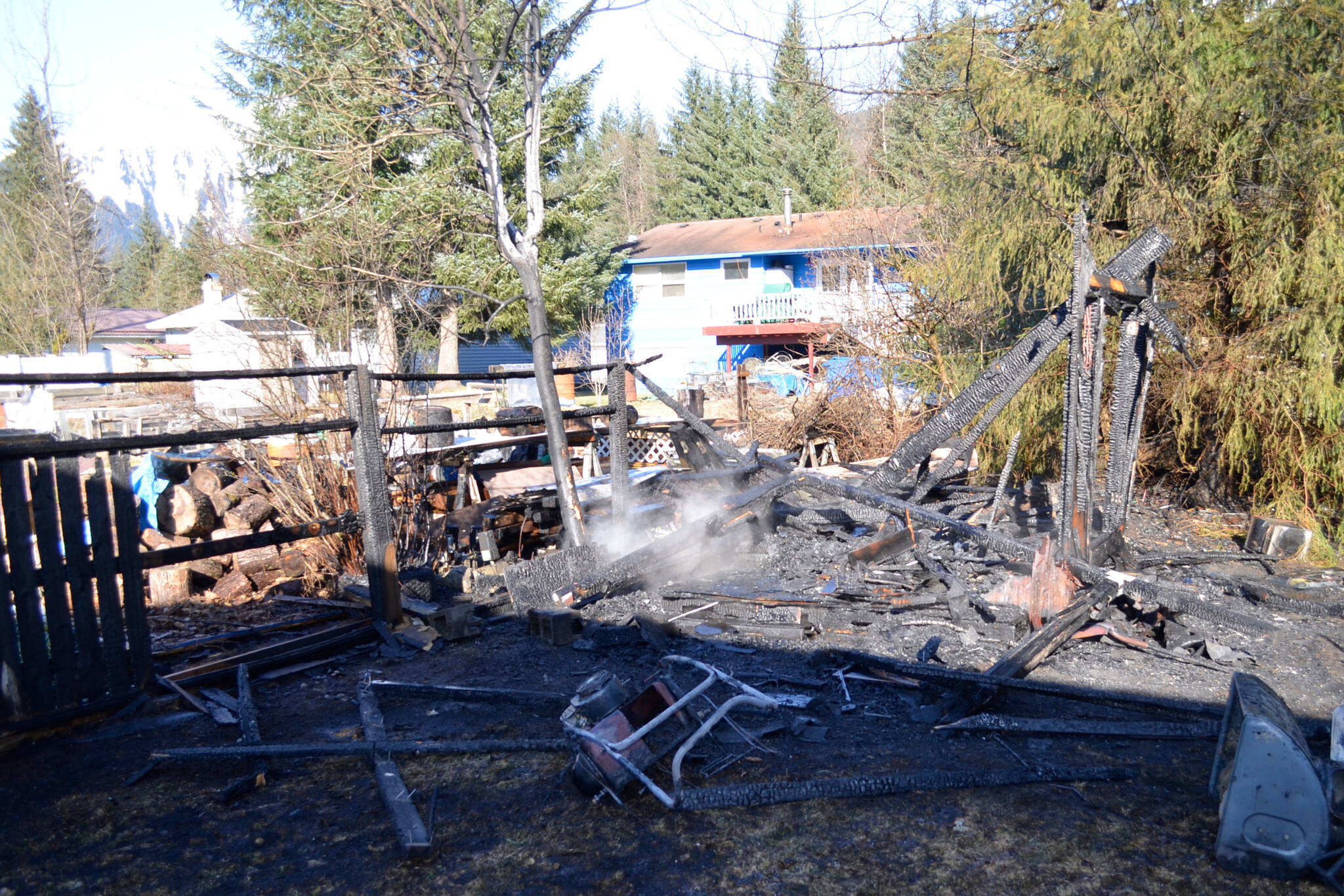 A child playing with lighter fluid started a fire in a backyard shed on Tuesday that completely consumed the structure. (Courtesy photo / Capital City Fire/Rescue)