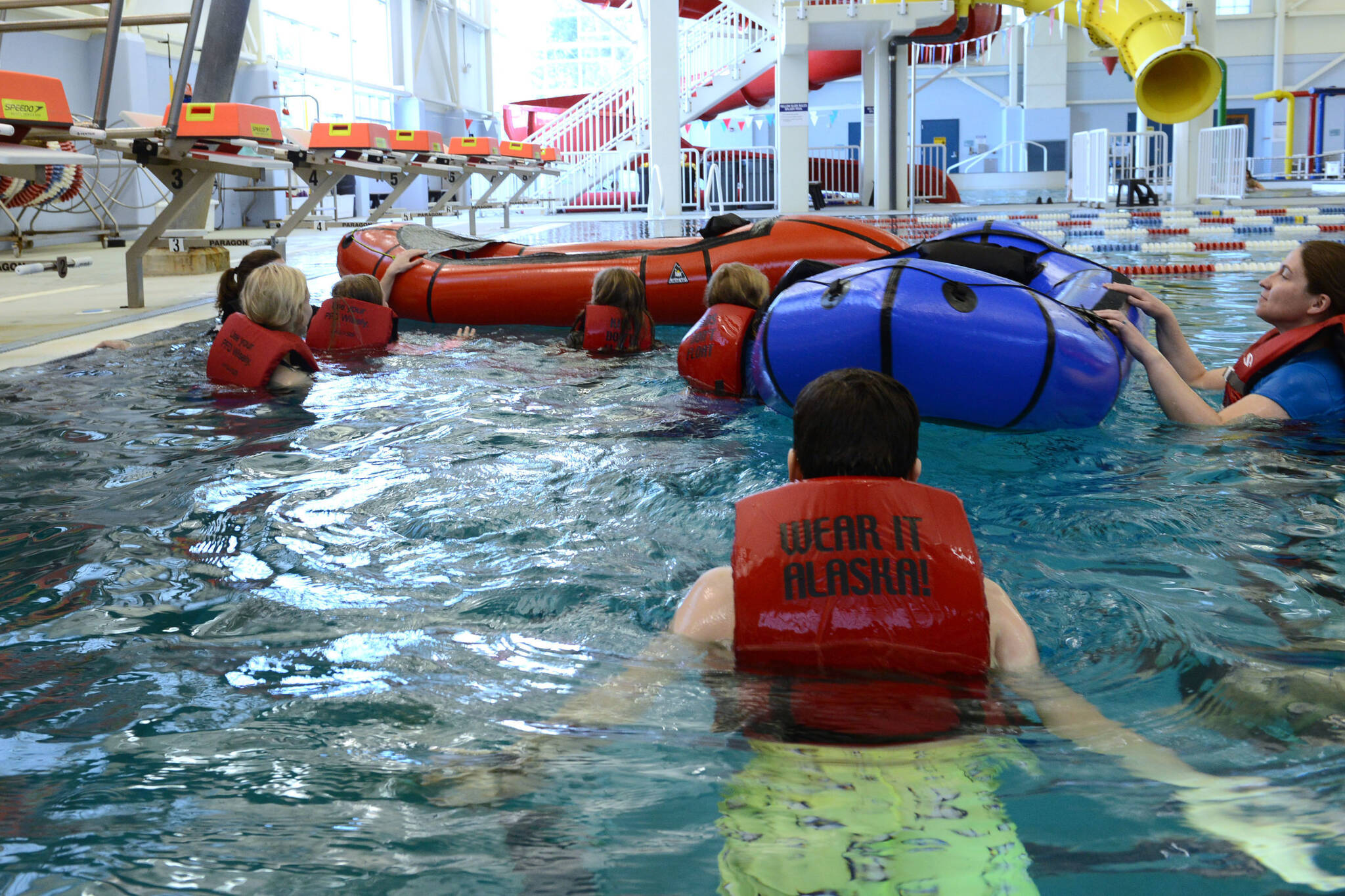 Soon-to-be instructors from the Goldbelt Heritage Foundation, Xheighaa Warrior Veteran Canoe Journey, Coast Guard Sector Juneau, and the 17th Coast Guard District took part in a Kids Don’t Float training session being held at Dimond Park Aquatic Center in Juneau, Alaska, April 13, 2022. (U.S. Coast Guard / Petty Officer 2nd Class Lexie Preston)