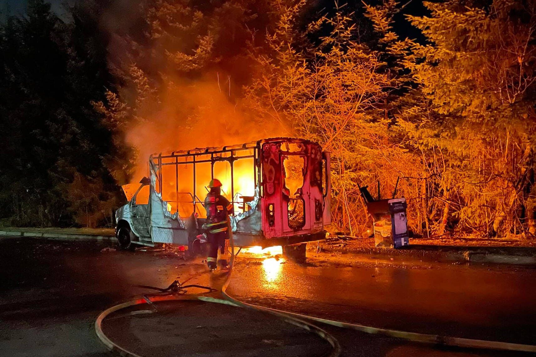 Courtesy photo / Travis Mead 
A Capital City Fire/Rescue firefighter moves to extinguish and early morning vehicle fire on April 19, 2022. The cause of the fire is under investigation.