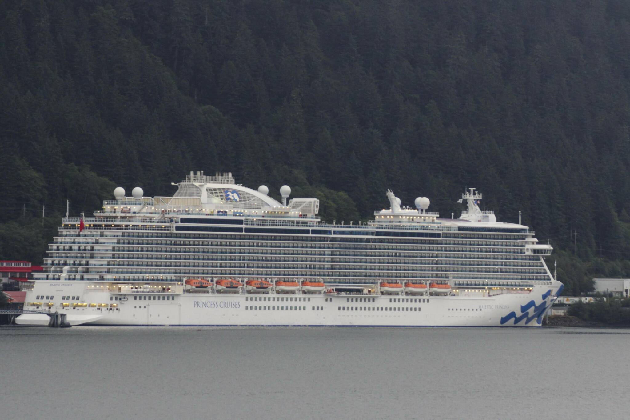 Michael Lockett / Juneau Empire file 
This August 2021 photo shows a Princess Cruise Line ship docked in Juneau. The cruise line announced this week that a controversial contactless payment method will not be expanded to Alaska in the immediate future. Prior to the decision, MedallionPay was panned by members of the business community.