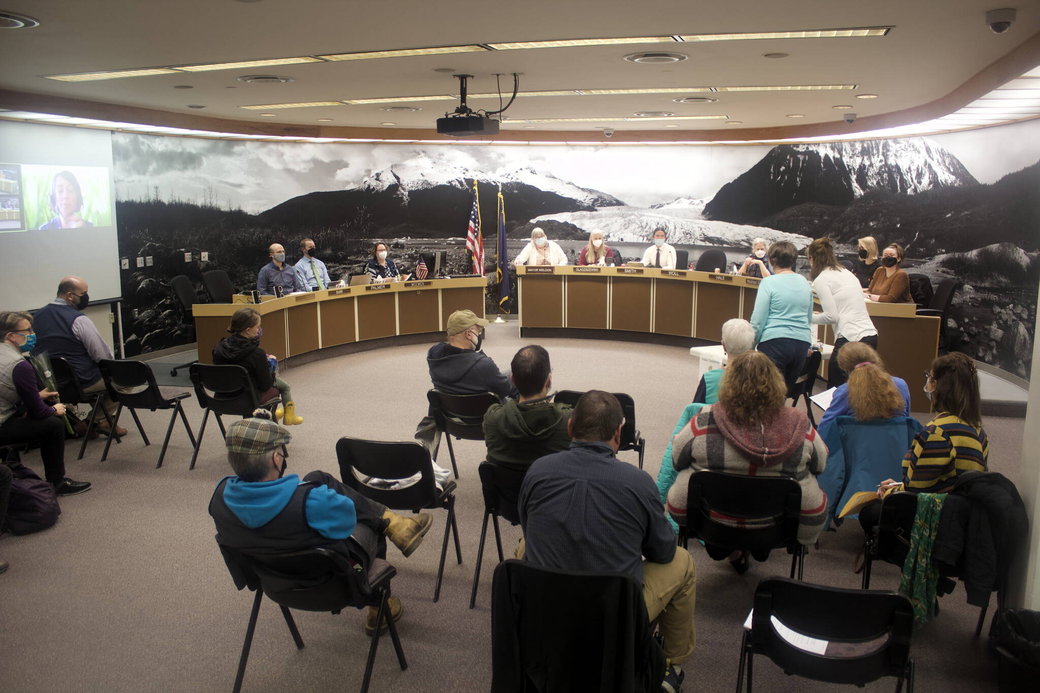This photo shows Juneau residents, the City and Borough of Juneau Assembly and CBJ staff in the Assembly Chambers in City Hall  during a Monday night meeting. (Mark Sabbatini / Juneau Empire)