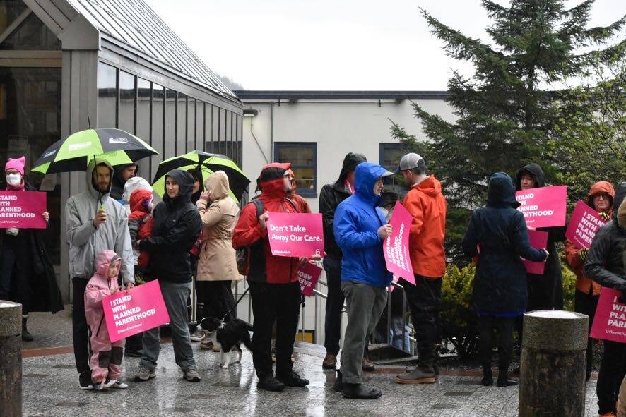 Protesters gather near the Alaska State Capitol on May 3,, following a leaked draft of a Supreme Court decision that would overturn the landmark case Roe v. Wade. (Peter Segall / Juneau Empire)