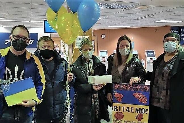 Courtesy photo / Dasha Pearson
Dasha Pearson (second from right) with her sister Natalia Dontsova (center) and father Alexander Dontsov (second from left) in Seattle on March 8, 2022. Pearson’s family fled Ukraine when the war started, and now they and other displaced Ukrainians are trying to find a home in Alaska.