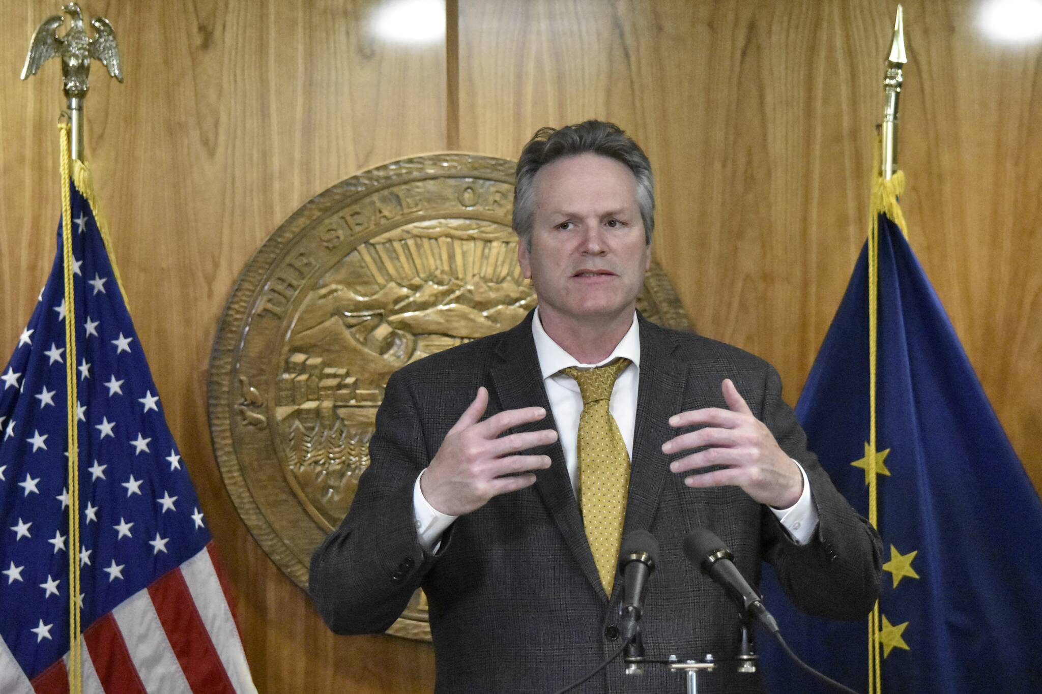 Gov. Mike Dunleavy speaks with reporters about the state’s budget at the Alaska State Capitol on Thursday, May 19, 2022. Dunleavy said lawmakers had sent a complete budget, and that there was no need for a special session. (Peter Segall / Juneau Empire)