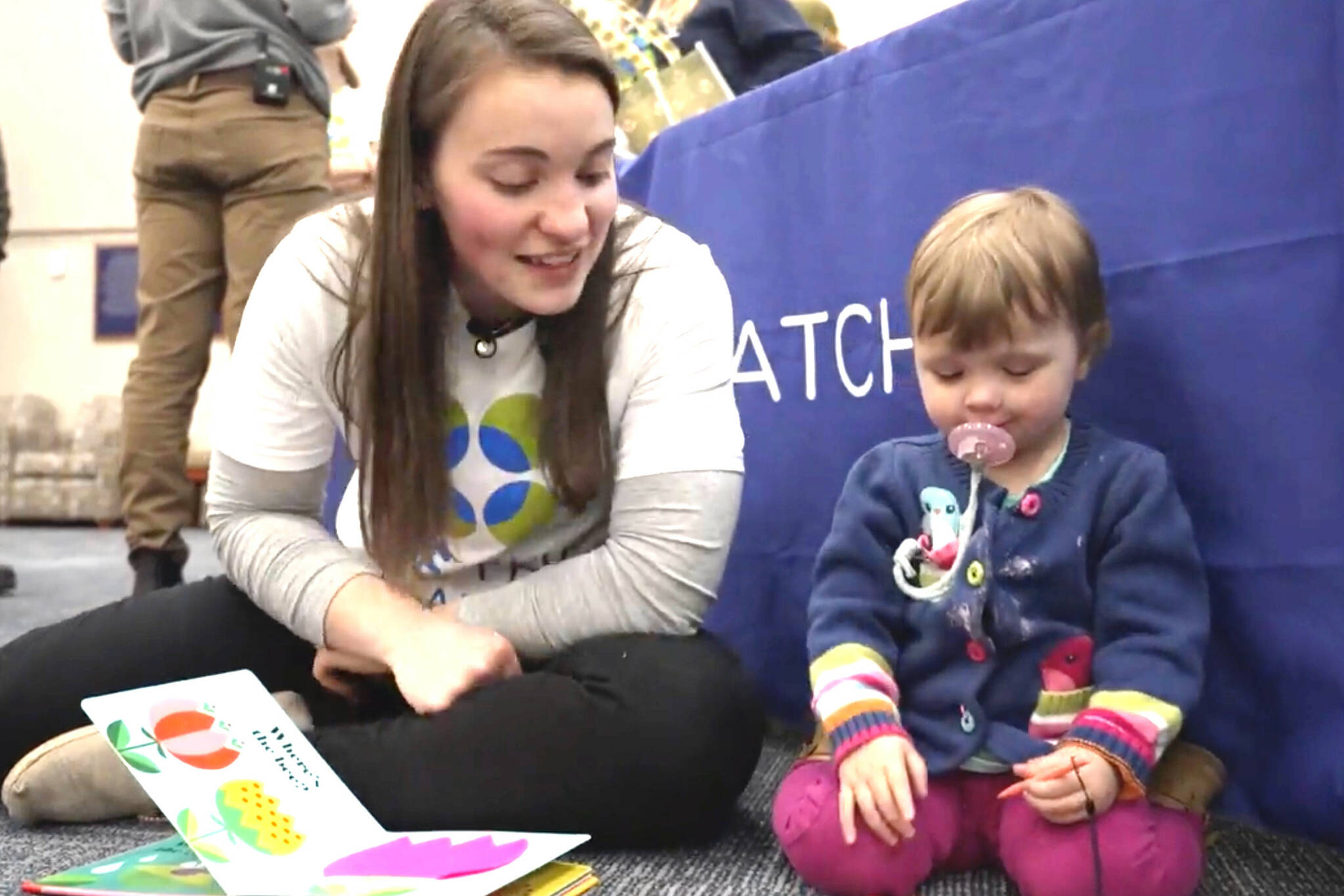 Shawen Bueckers, left, meets the girl who she donated bone marrow to, Amelia Bellmore, at a Be the Match event at Brigham Young University in 2022. (Screenshot)