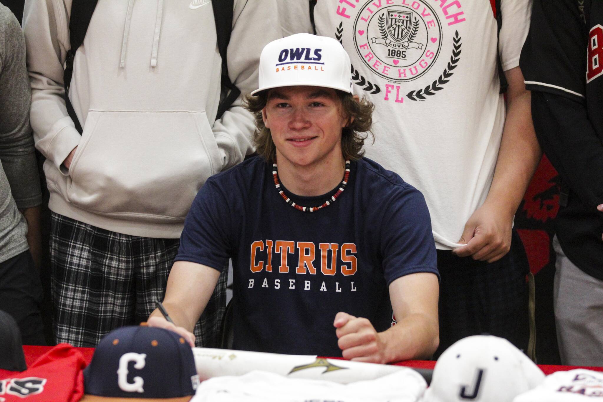 Porter Nelson, a senior at Juneau-Douglas High School: Yadaa.at Kalé, signed his letter of intent to play baseball for Citrus College, a community college located in Glendora, California, on May 24, 2022. “I was pretty stoked. I didn’t think they were going to answer my email,” said Nelson about the college extending the offer. “They’re the dream for me.” Nelson plays center fielder, and intends to study kinesiology, he said. (Michael S. Lockett / Juneau Empire)
