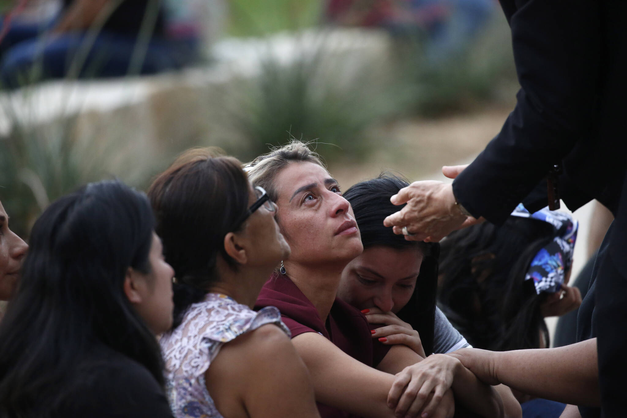 The archbishop of San Antonio, Gustavo Garcia-Siller, comforts families outside of the Civic Center in Uvalde, Texas Tuesday, May 24, 2022. (AP Photo / Dario Lopez-Mills)