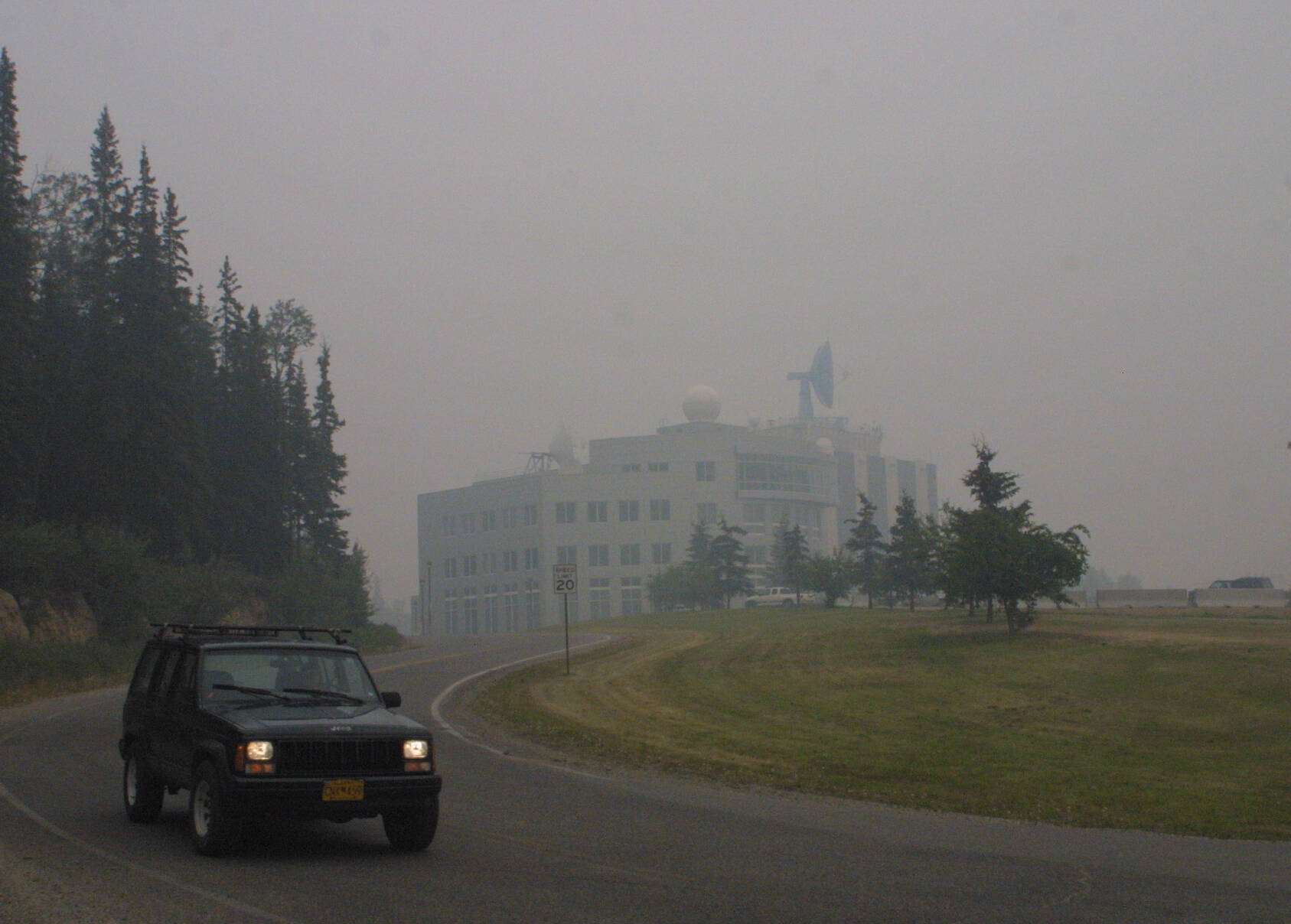 The Akasofu Building on the University of Alaska Fairbanks campus is bathed in smoke during the dramatic summer of 2004. Photo by Ned Rozell.
