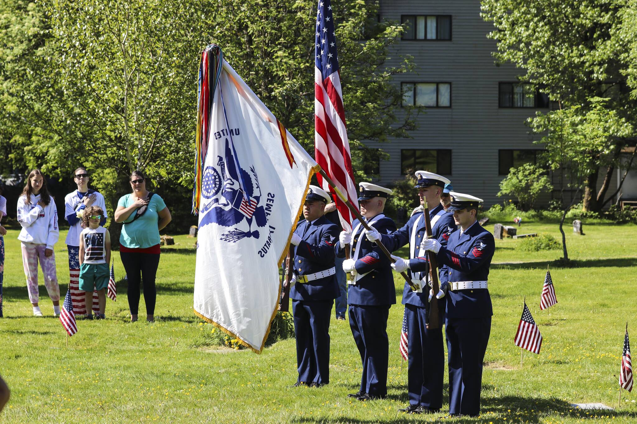 Michael S. Lockett / Juneau Empire 
A Coast Guard color guard presents the colors during a Memorial Day ceremony held by the Veterans of Foreign Wars at Evergreen Cemetery on Monday.