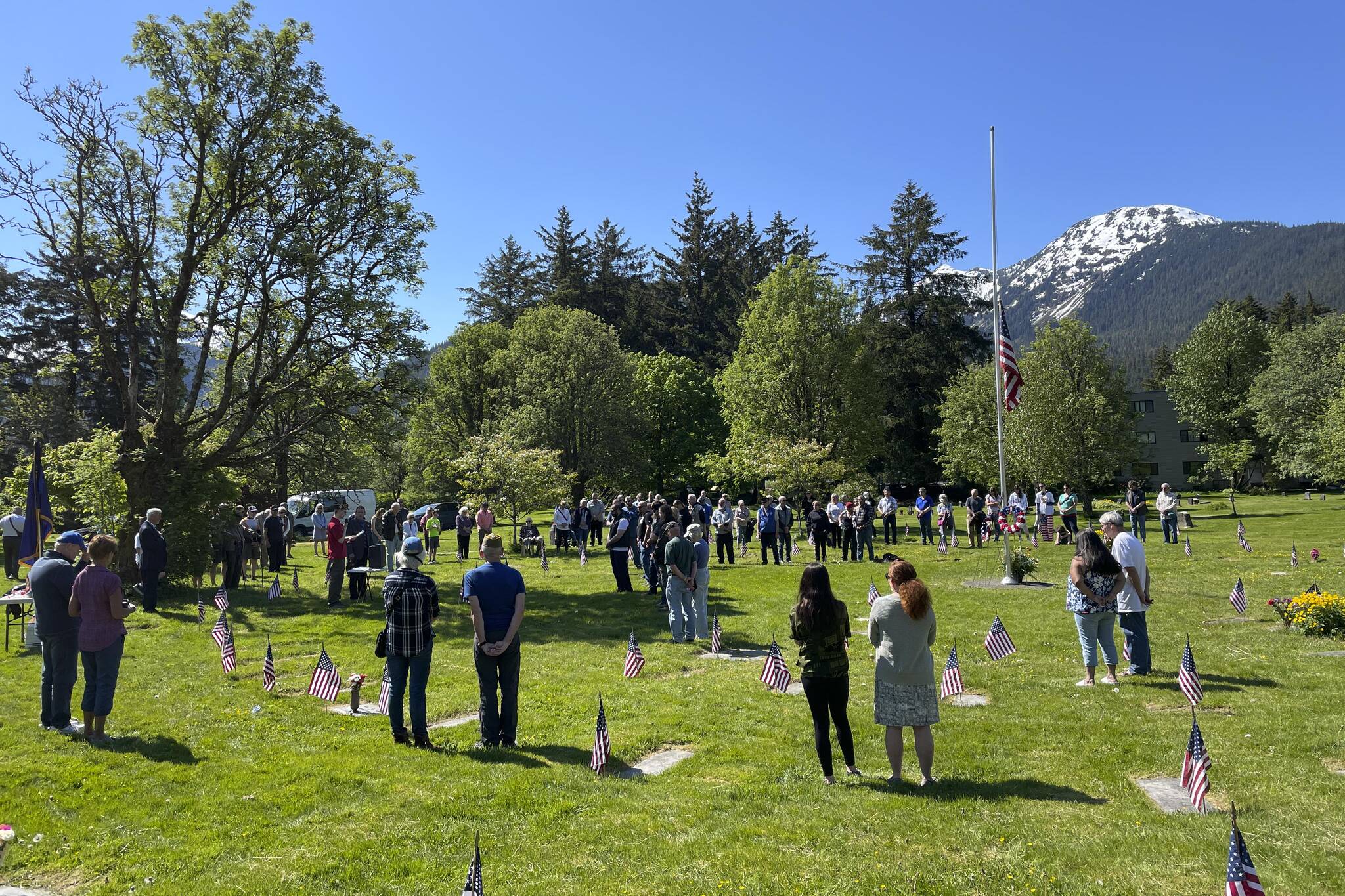 Dozens of Juneau residents attended a Memorial Day ceremony held by the Veterans of Foreign Wars at Evergreen Cemetery on May 30, 2022. (Michael S. Lockett / Juneau Empire)