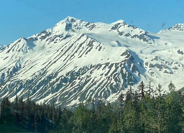 Snow-capped images along the Alaska Highway on June 15. (Courtesy Photo / Denise Carroll)