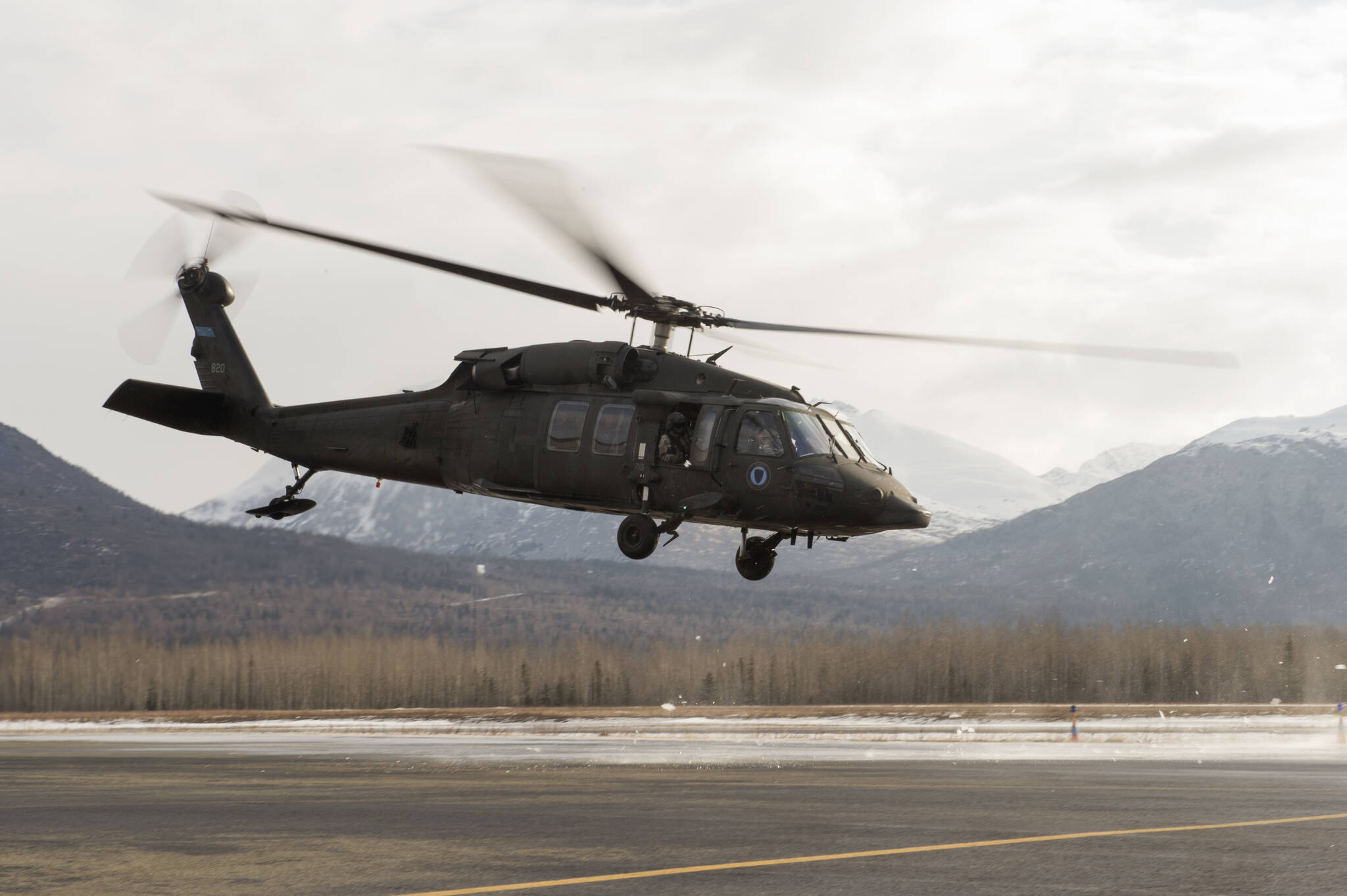 An Alaska Army National Guard aircrew flying a UH-60 Black Hawk aided in the rescue of a mountain biker with a possible spinal injury from the wilderness east of Kenai on May 30, 2022. (Alejandro Pena / U.S. Air Force)
