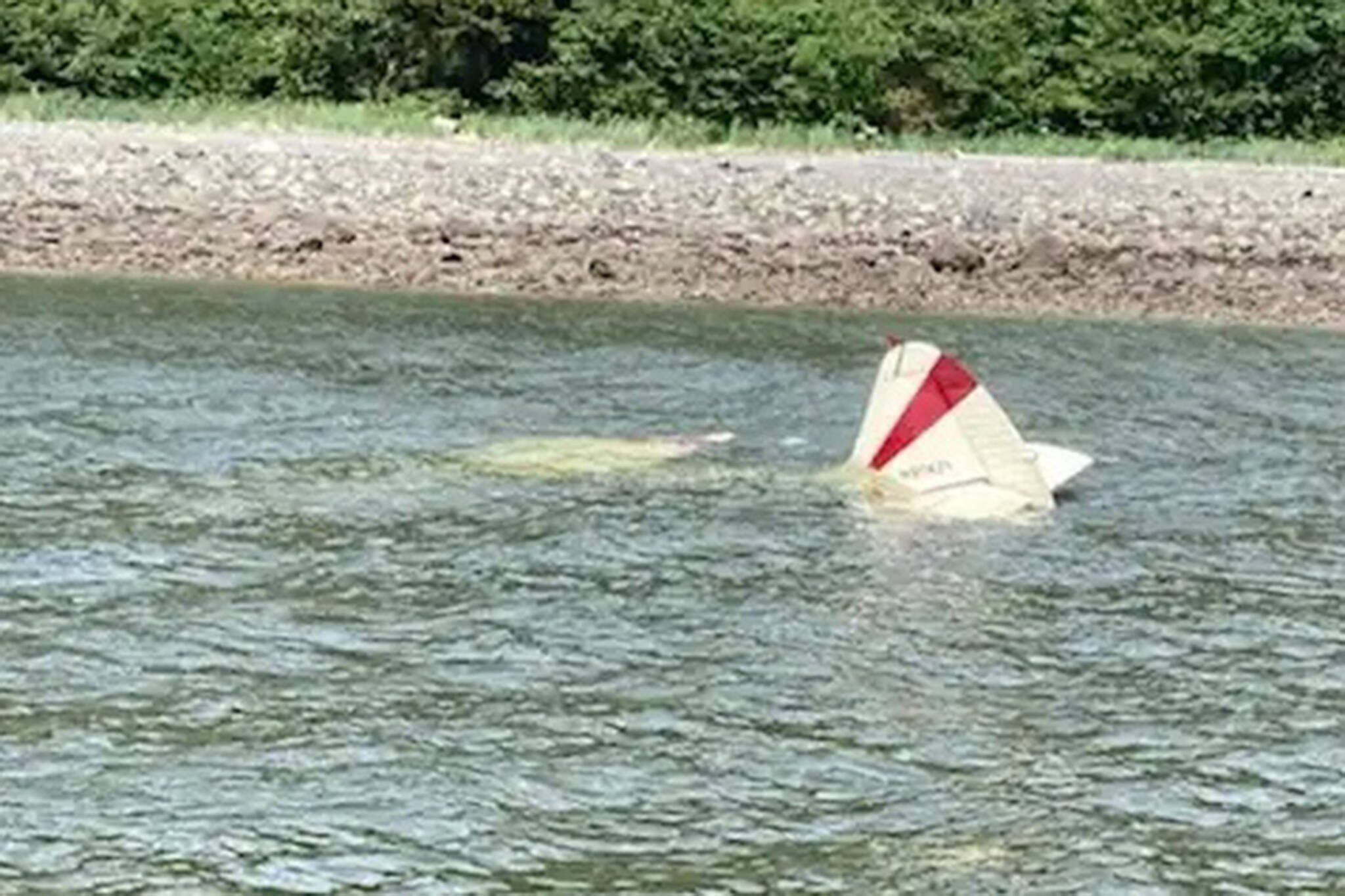 The Coast Guard medevaced two people from shore after their plane crashed in the water near Outer Point on Douglas Island, Alaska, June 7, 2022. The two survivors immediately swam ashore after their plane crashed approximately 100 feet from shore. (Courtesy Photo / Coast Guard)