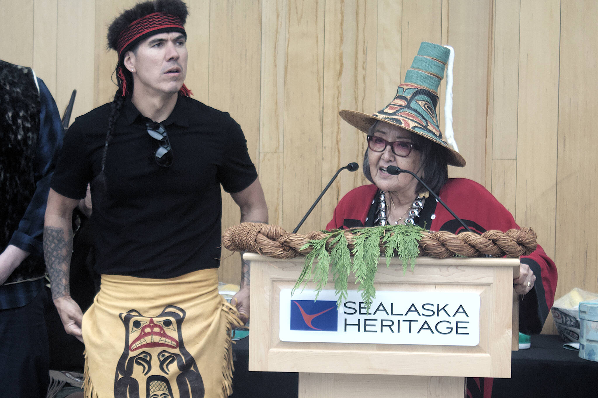 Mark Sabbatini / Juneau Empire
Haida artist TJ Young (Sgwaayaans), left, master carver of Alaska’s first 360-degree totem that was part of Wednesday’s debut of the Sealaska Heritage Arts Campus, is congratulated for his work by Rosita Kaaháni Worl, president of Sealaska Heritage Institute and moderator of the ceremony. The midday gathering marked the beginning of Celebration, which is returning to Juneau as an in-person event for the first time in four years after the COVID-19 pandemic forced organiziers to turn it into a virtual event.