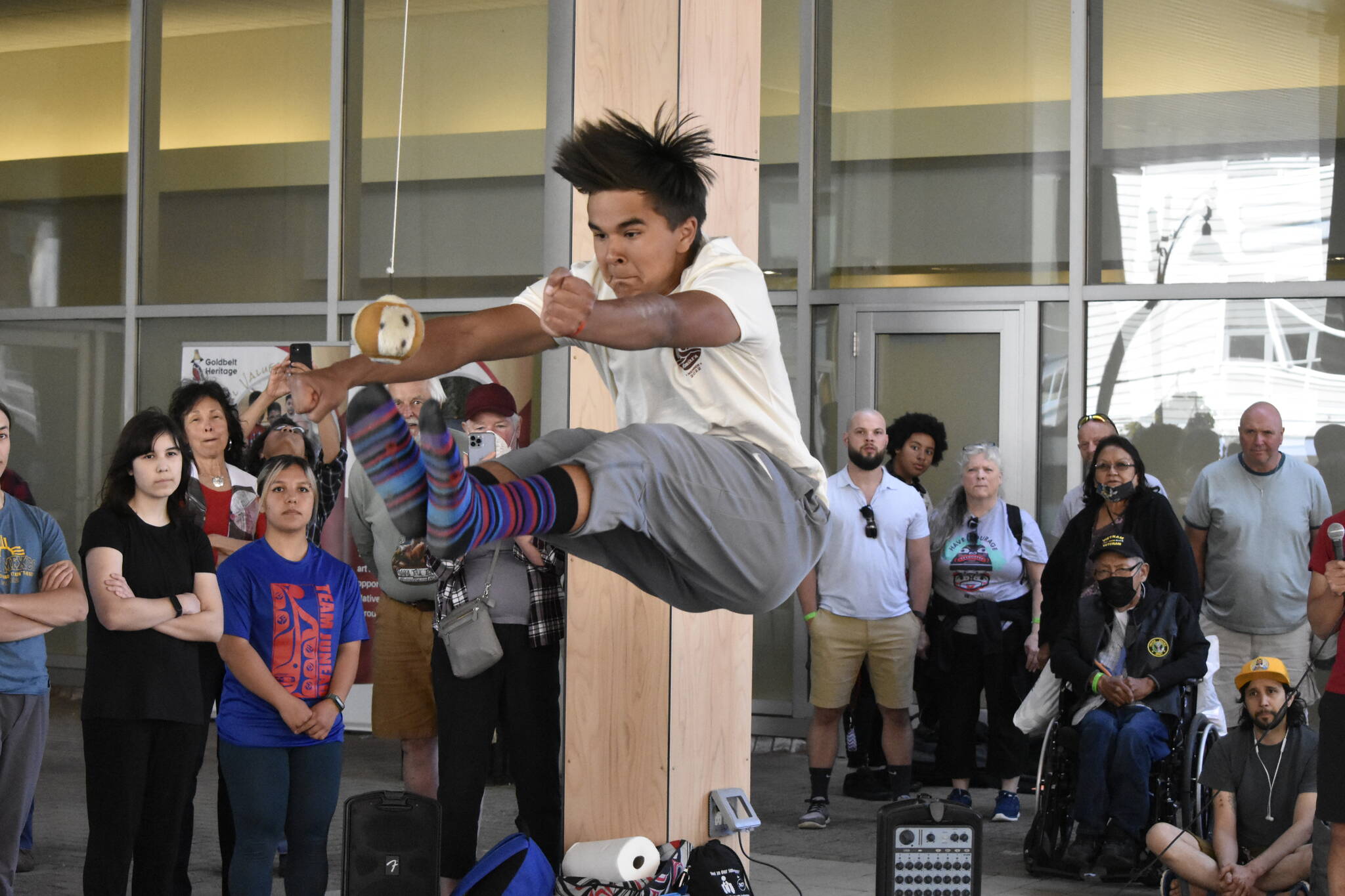 Nathan Blake, 15, does a two-foot high kick during a demonstration of traditional Arctic games at the Sealaska Arts Campus on Thursday, June 8, 2022, part of the Celebration 2022 festivities. (Peter Segall / Juneau Empire)