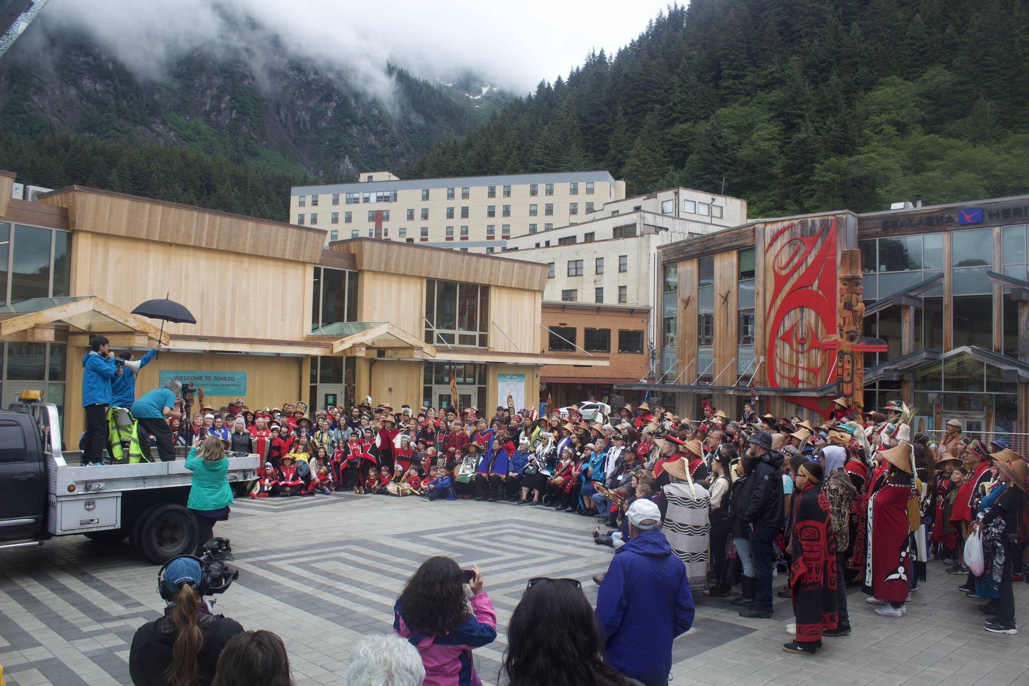 Most of the 1,200 dancers participating in Celebration this year gather for a group photo at the newly opened Sealaska Heritage Campus on Saturday morning just before the parade to Centennial Hall for the final events of the four-day gathering. (Mark Sabbatini / Juneau Empir