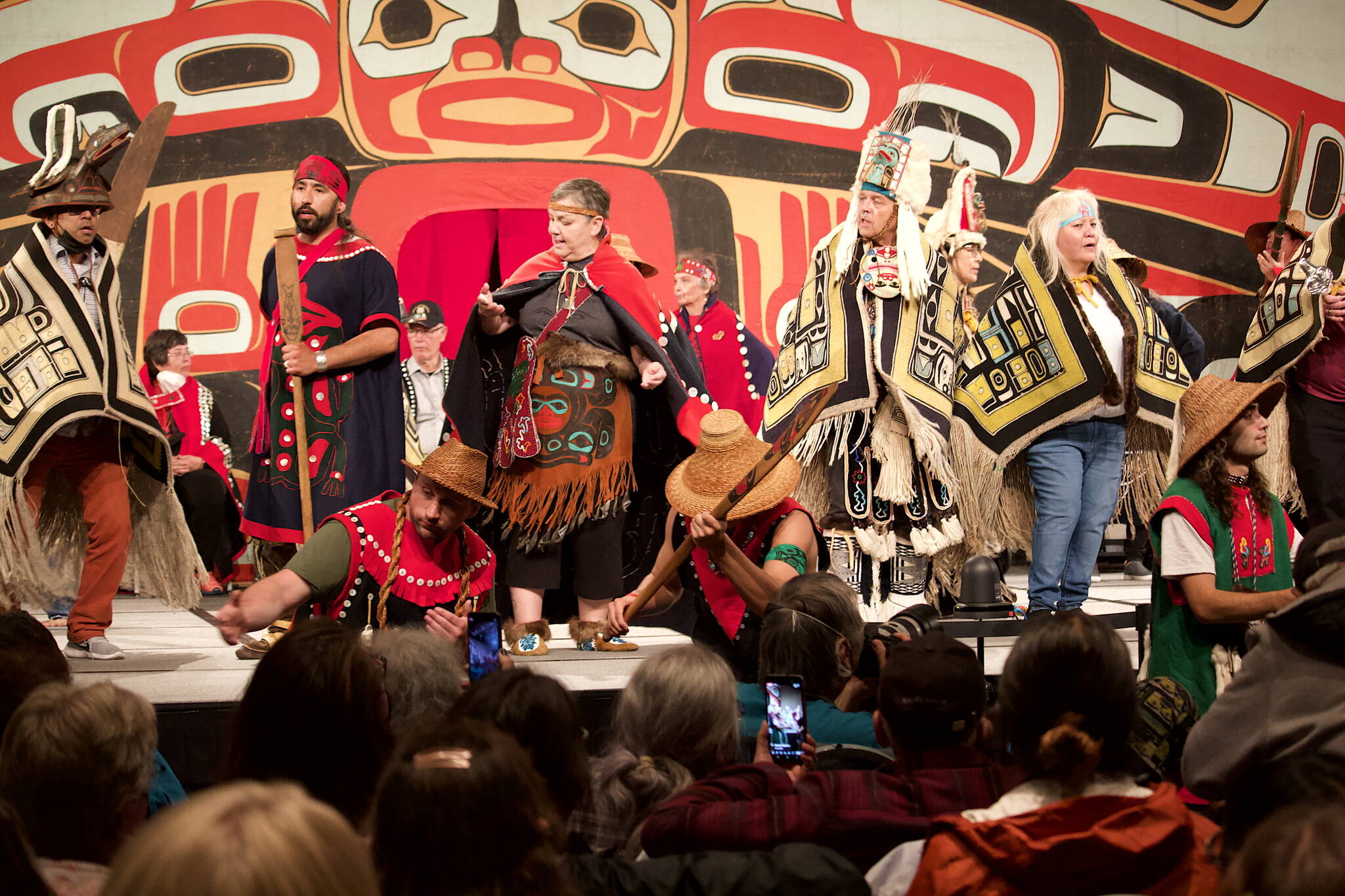 Alaska Native dancers gather for a final time on the stage at Centennial Hall for the Grand Exit of this year’s four-day Celebration. (Mark Sabbatini / Juneau Empire)