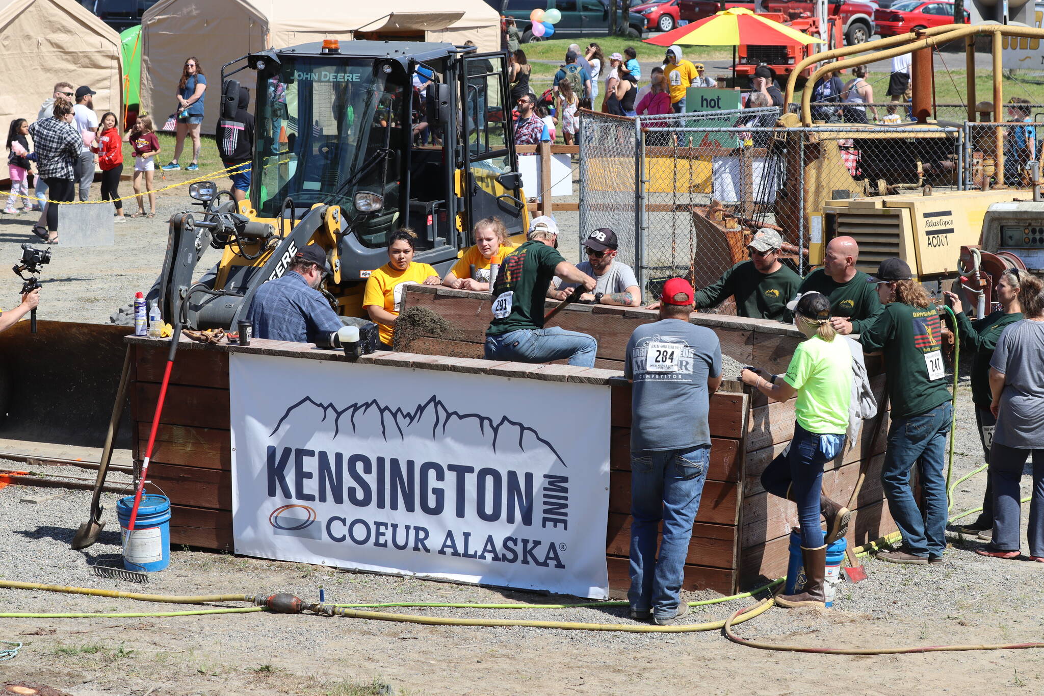 A competitor slings gravel during men’s hand mucking event of Juneau Gold Rush Days in Savikko Park on June 18, 2022. (Michael S. Lockett / Juneau Empire)