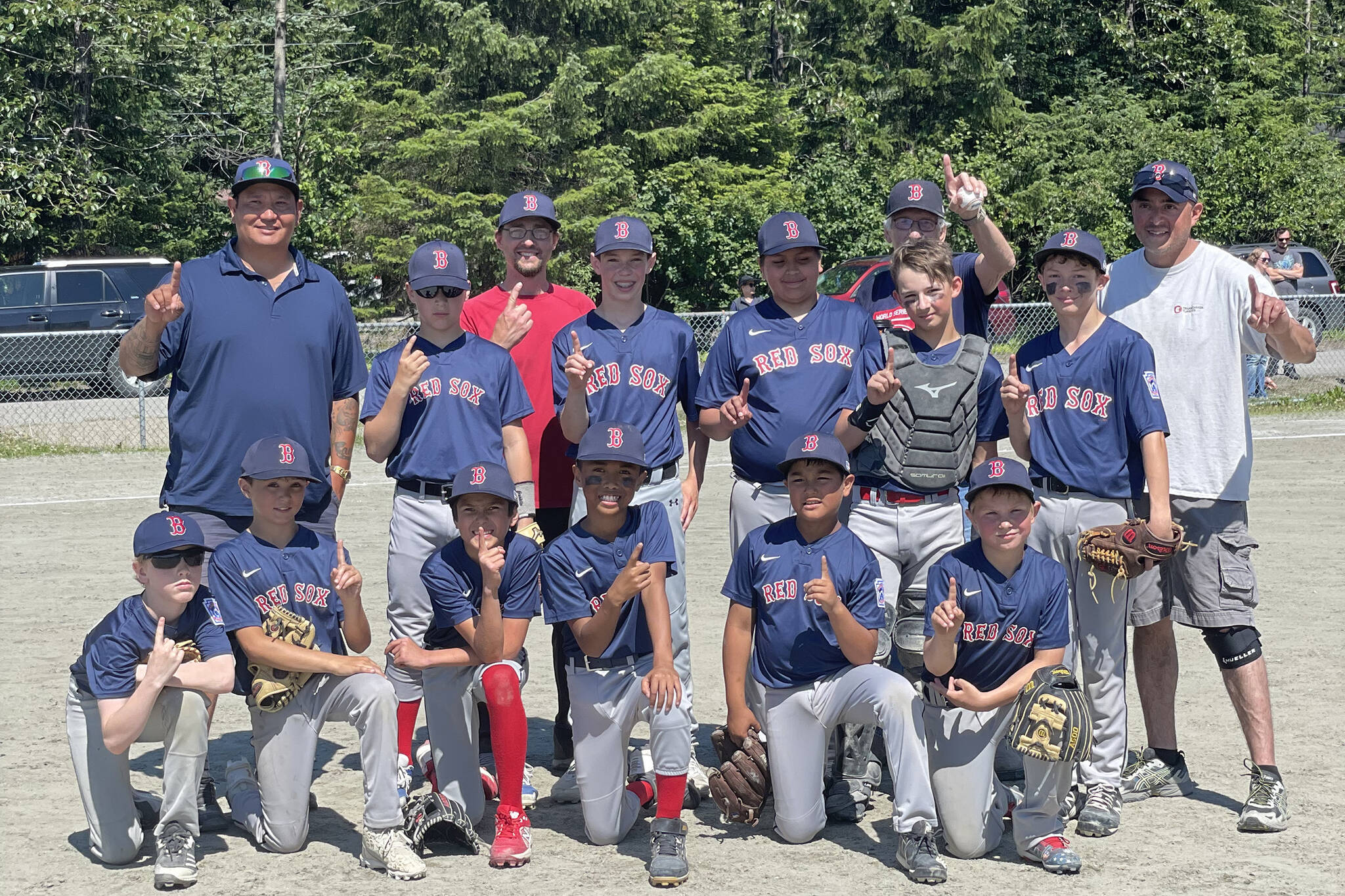 The 2022 Gastineau Little League Majors Division champs are the Juneau Pizza Red Sox. Team members are: (Back row, left to right) manager Nick Nelson, Darwin Decena, coach John Randolf, Andrew Sanders, Joaquin Ramirez, coach PJ, Jamison Randolf, Brenner Harralston, coach Tom Pegues, (front row, left to right) Liam keisseling, Jack Pegues, Micah Nelson, Myles Pasion, Marquis Lim, Matthew Shockly and Fischer Kolodziejski (not pictured.) (Courtesy Photo / Nick Nelson)