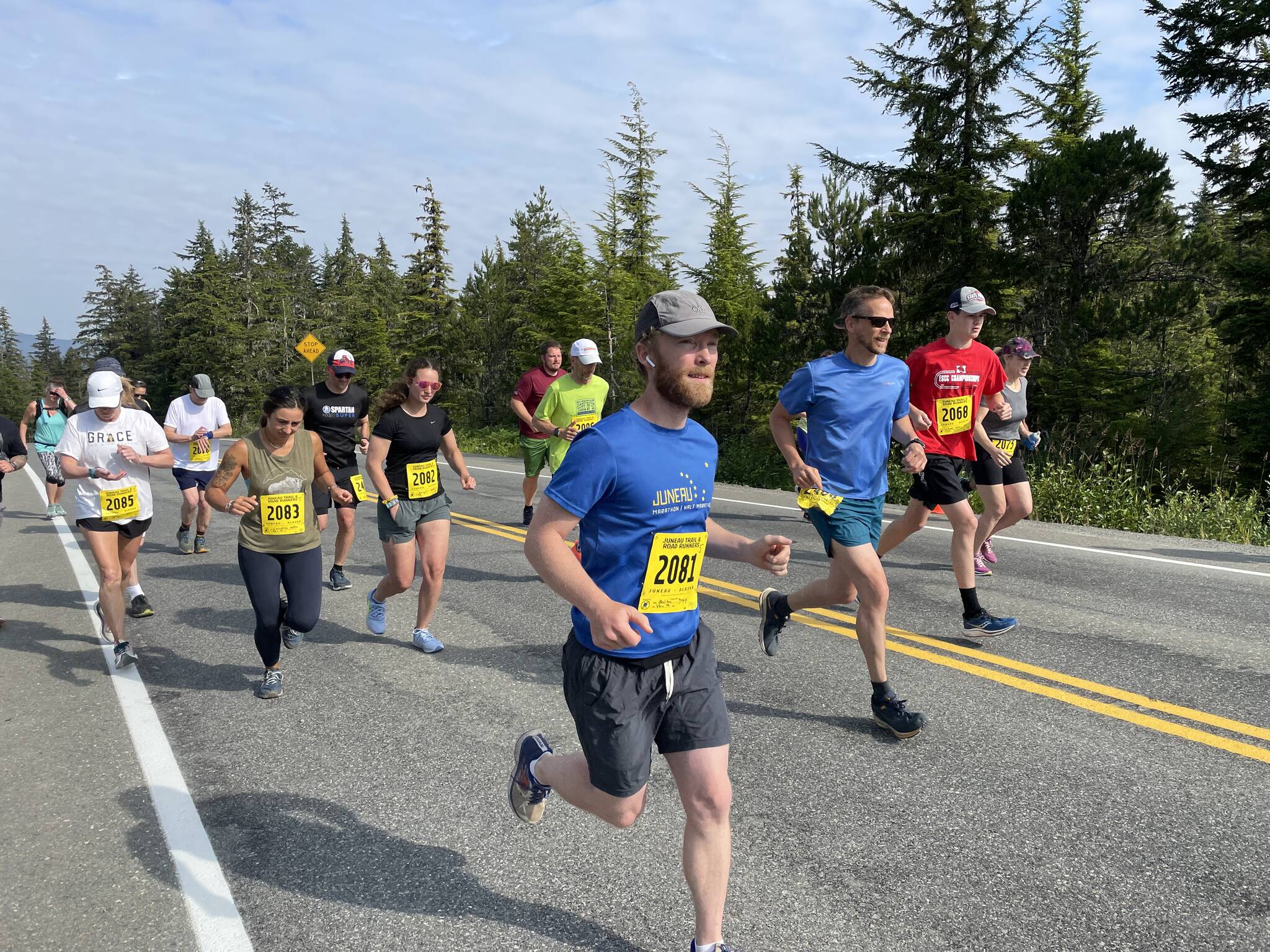 Runners race off the starting line during the Eaglecrest Road and Ridge Race on July 2, 2022. (Michael S. Lockett / Juneau Empire)