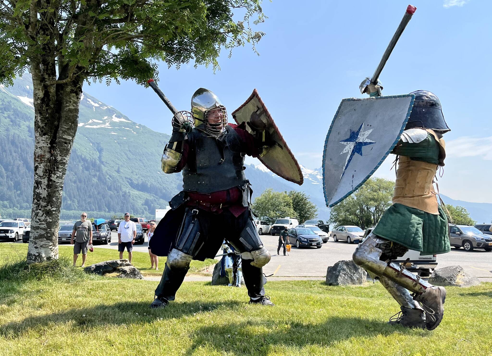 Hill Lewis, aka Rolland, and Arthur McVey, aka Arthur Bloodworth, fight for glory as a crowd gathered in Savikko Park during the Douglas Fourth of July festivities. (Jonson Kuhn / Juneau Empire)