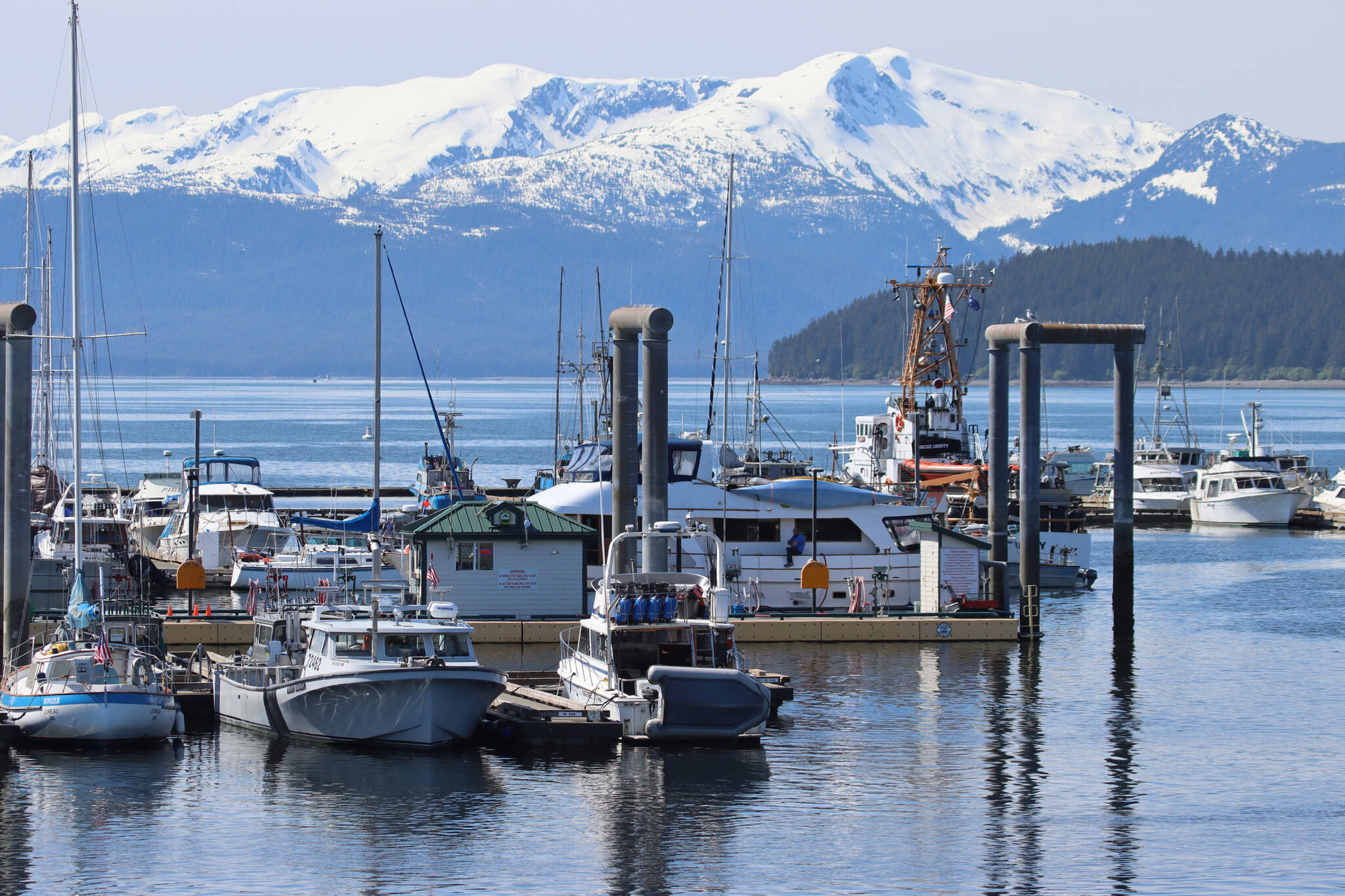 This photo shows boats moored at Don D. Statter Harbor on a recent sunny day. According to statistics recently release by the U.S. Coast Guard, boating accidents were down in Alaska in 2021.(Ben Hohenstatt / Juneau Empire)