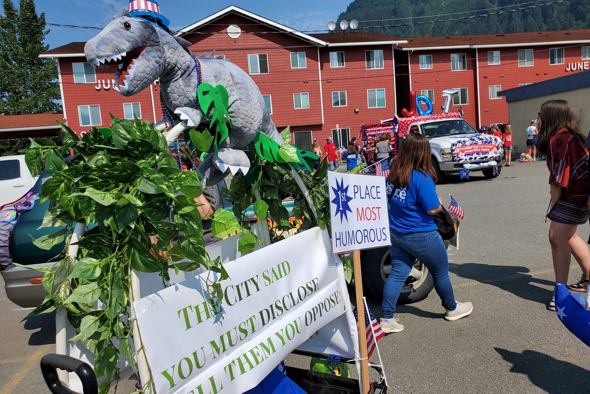 Courtesy of Protect Juneau Homeowners’ Privacy 
An Uncle Sam dinosaur adorns part of a float in Juneau’s July 4 by the group Protect Juneau Homeowner’s Privacy, which has successfully put a referendum on the Oct. 4 municipal election ballot to eliminate a requirement that property buyers publicly disclose purchase prices.