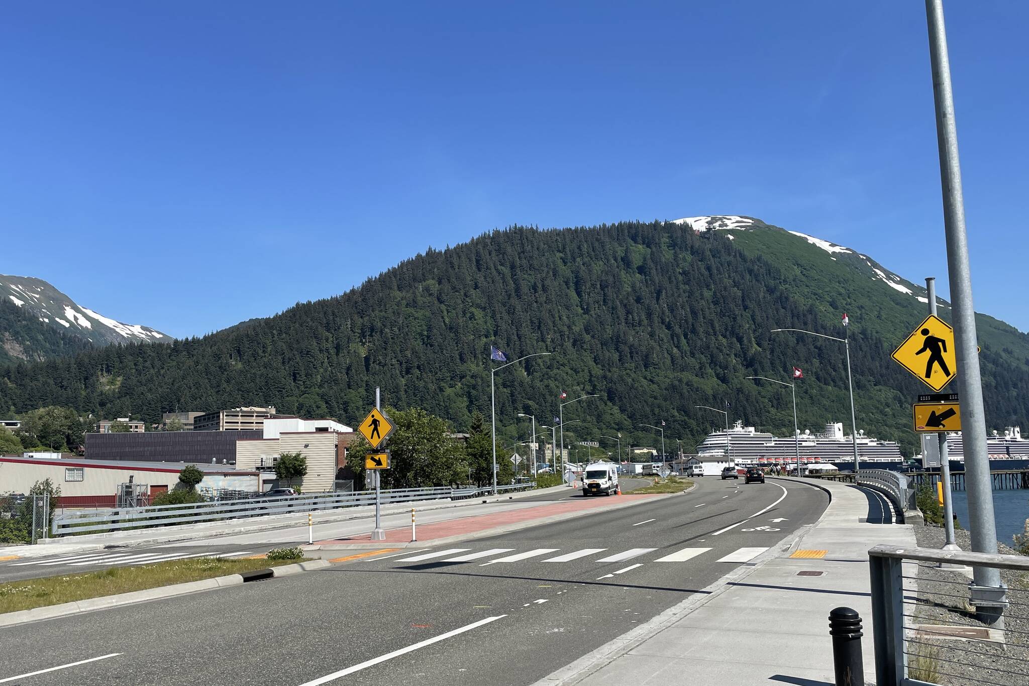 A 13-year-old girl was medevaced after being struck by a vehicle near the crosswalk across Egan Drive by Gold Creek on June 27, 2022. (Michael S. Lockett / Juneau Empire file)