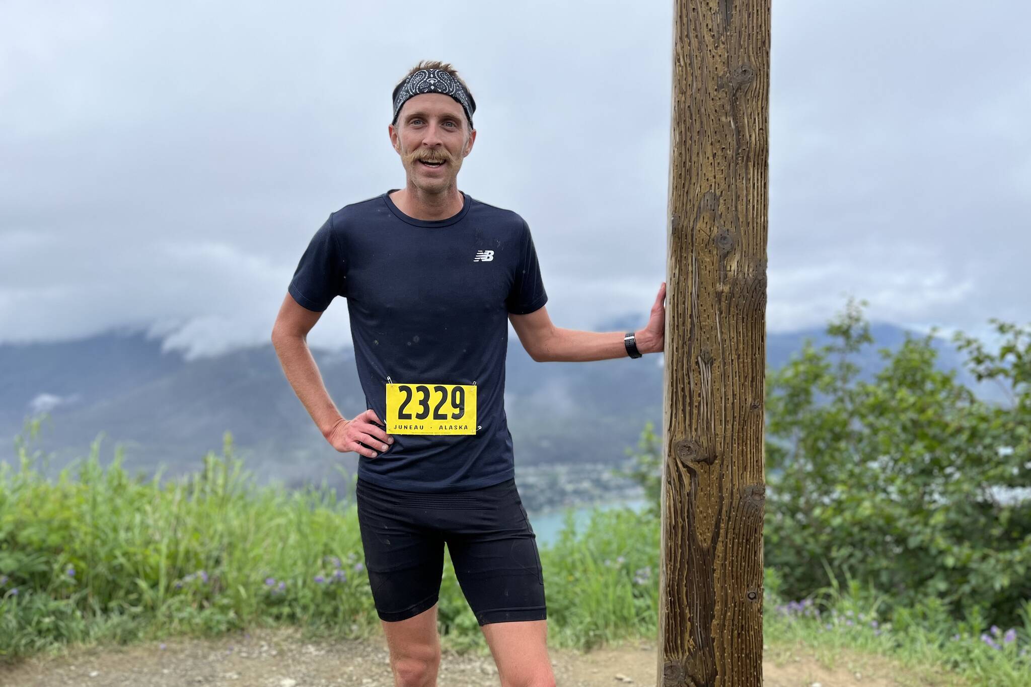 This year’s Mount Roberts Trail Race first-place winner Seth Rutt catches his breath after completing the race in under 40 minutes. (Jonson Kuhn / Juneau Empire)