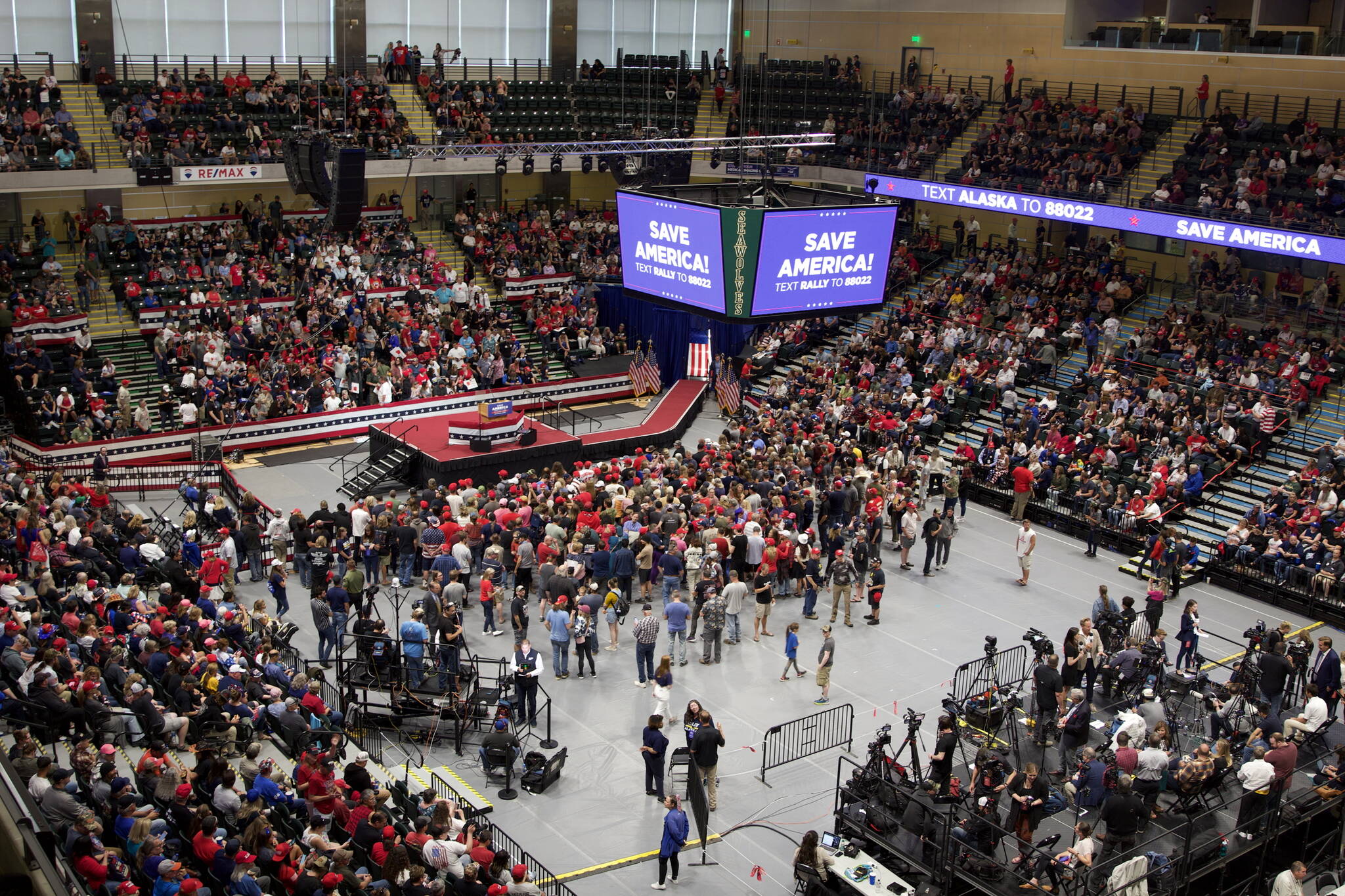 Rally-goers stream into the Alaska Airlines Center Saturday afternoon. By the time former President Donald Trump took the stage shortly before 5 p.m., the arena was full. (Mark Sabbatini / Juneau Empire)