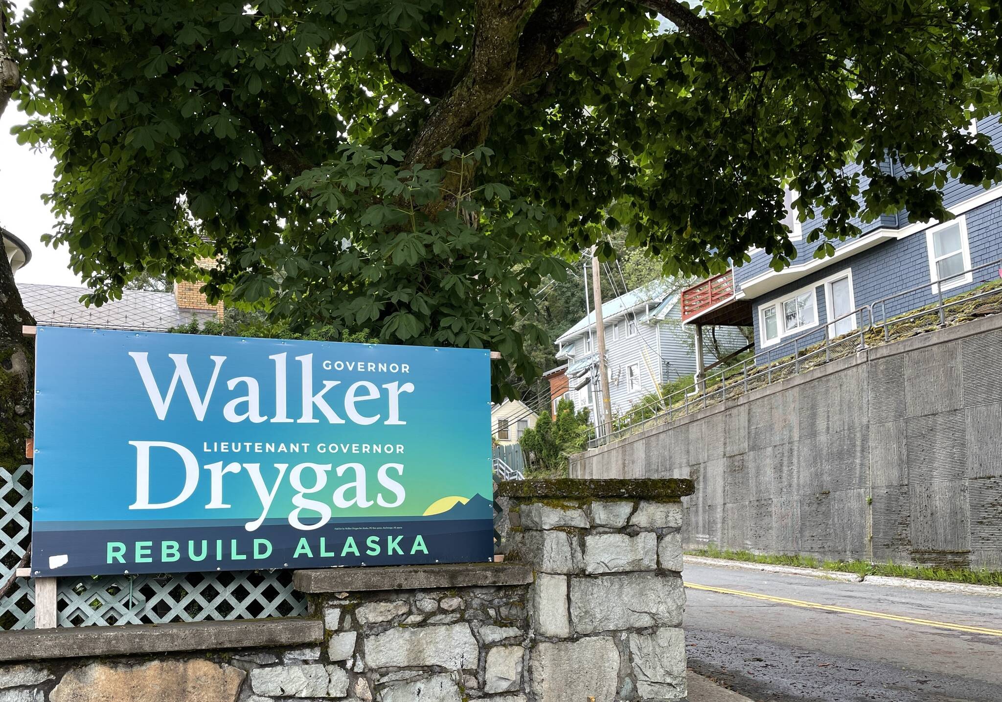A Walker-Drygas campaign sign stands across from the governor’s mansion in Juneau. Financial forms recently filed with the state showed contributions to gubernatorial campaigns up sharply from the same time period four years ago. (Michael S. Lockett / Juneau Empire)