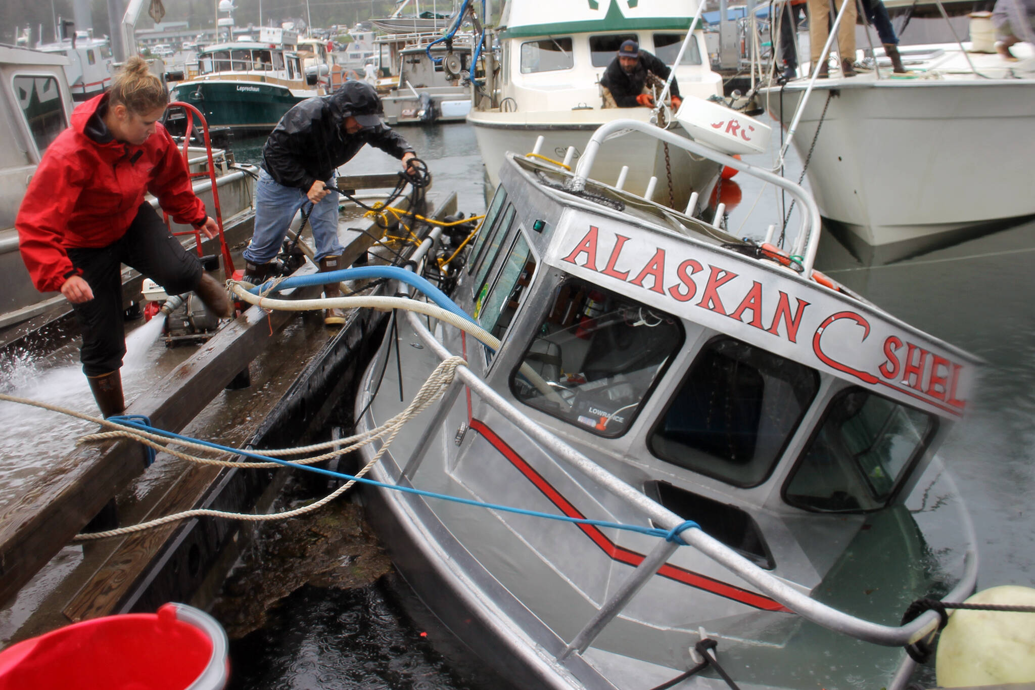 The Alaskan Shel had been taking in water for more than an hour by 7 p.m. Wednesday. (Clarise Larson / Juneau Empiure)