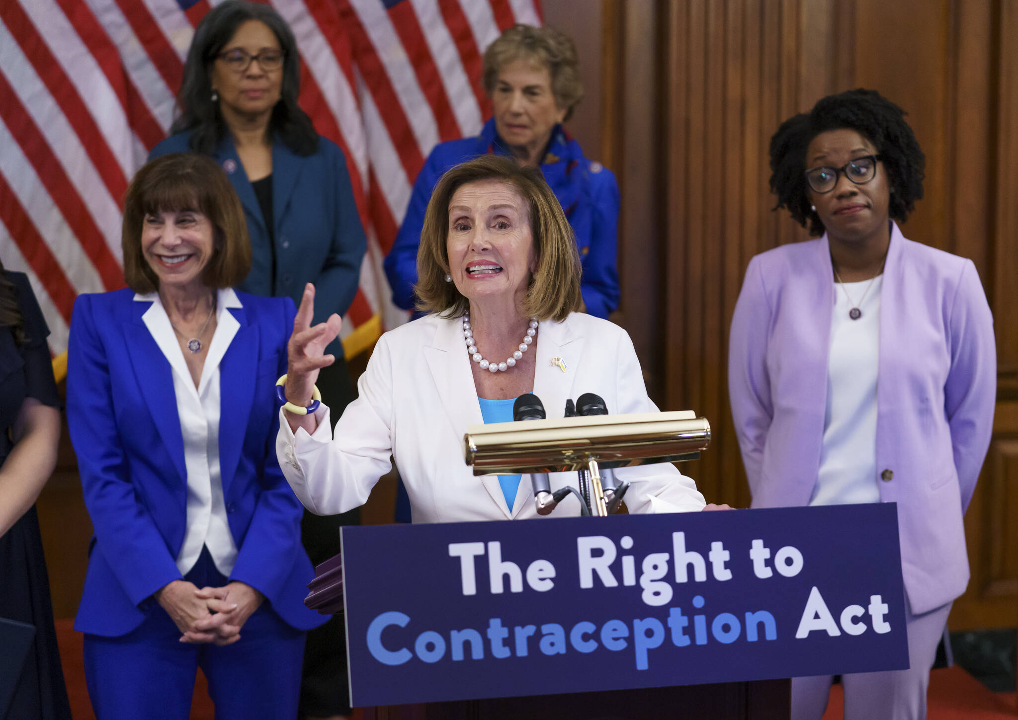 Speaker of the House Nancy Pelosi, D-Calif., makes a point during an event with Democratic women House members and advocates for reproductive freedom ahead of the vote on the Right to Contraception Act, at the Capitol in Washington, Wednesday, July 20, 2022. She is flanked by Rep. Kathy Manning, D-N.C., and Rep. Lauren Underwood, D-Ill. Democrats are pushing legislation through the House that would inscribe the right to use contraceptives into law. (AP Photo/J. Scott Applewhite)