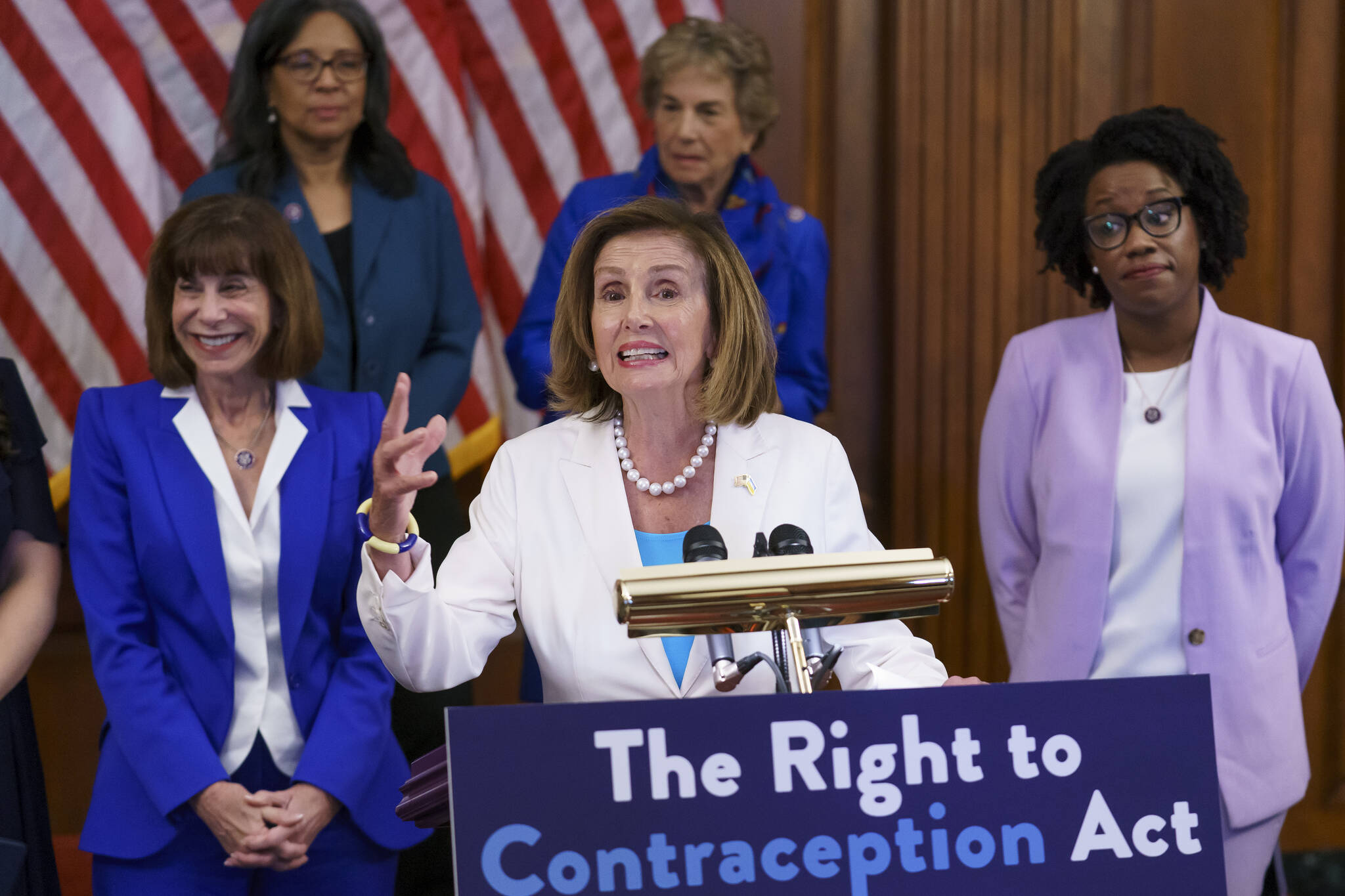 Speaker of the House Nancy Pelosi, D-Calif., makes a point during an event with Democratic women House members and advocates for reproductive freedom ahead of the vote on the Right to Contraception Act, at the Capitol in Washington, Wednesday, July 20, 2022. She is flanked by Rep. Kathy Manning, D-N.C., and Rep. Lauren Underwood, D-Ill. Democrats are pushing legislation through the House that would inscribe the right to use contraceptives into law. (AP Photo/J. Scott Applewhite)
