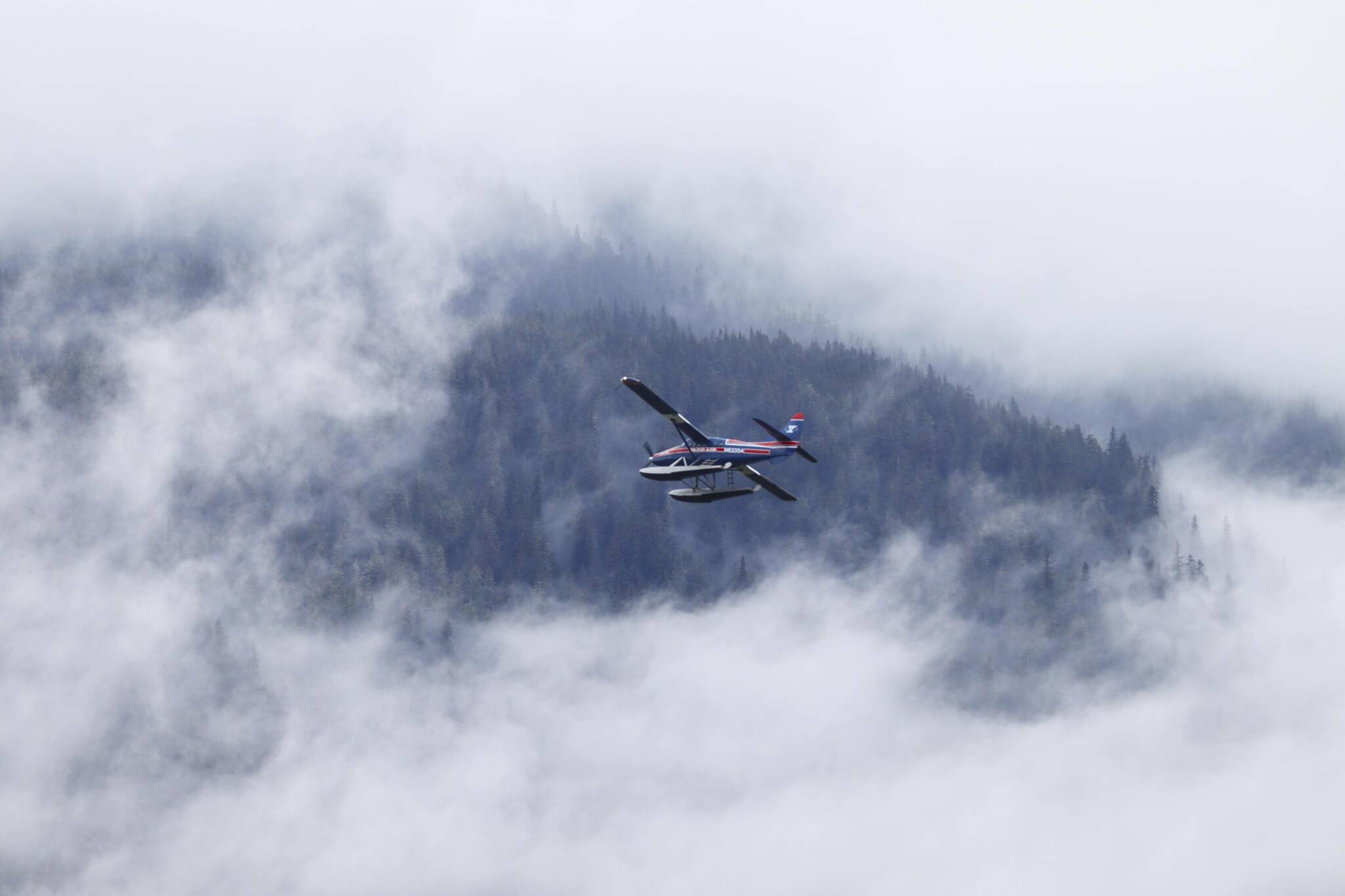 A Ward Air seaplane takes off on July 23, 2022. Low cloud ceilings and limited visibility have scrubbed a number of flights from small airplane operators who are in the Southeast recently. (Michael S. Lockett / Juneau Empire)
