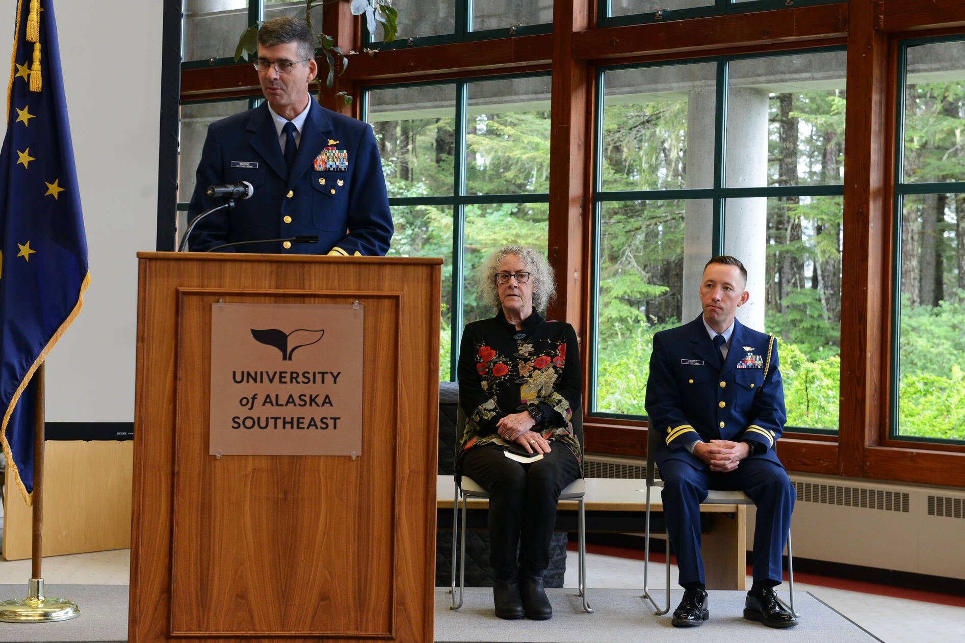 Rear Adm. Nathan Moore, commander of Coast Guard District 17, speaks during a ceremony at University of Alaska Southeast for the renewal of the College Student Pre-Commissioning Initiative on July 25, 2022. (Courtesy photo / USCG)