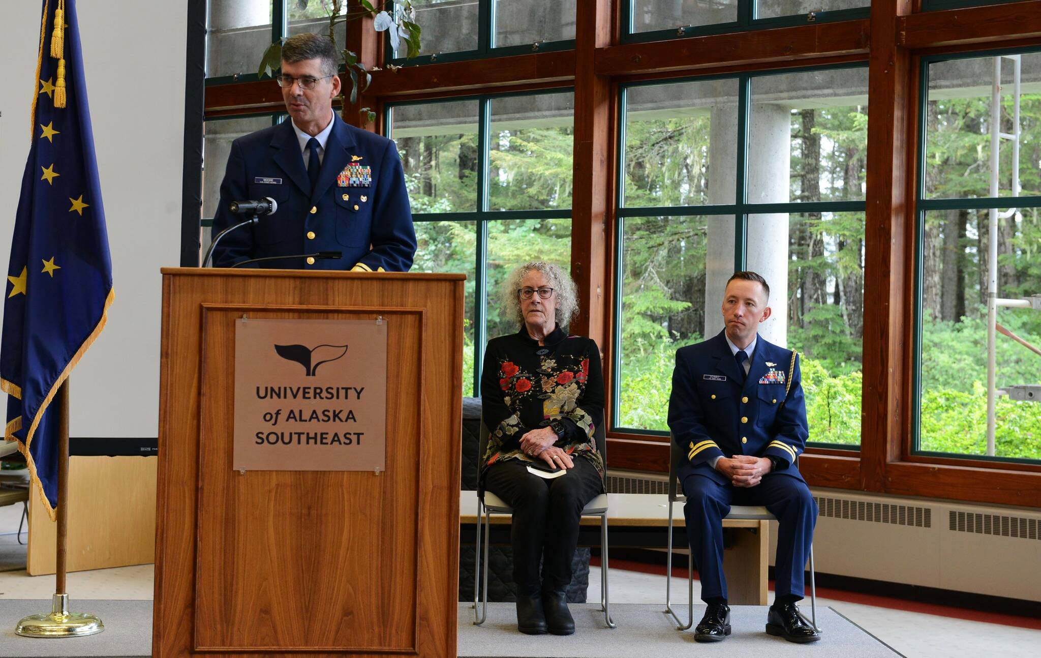 Rear Adm. Nathan Moore, commander of Coast Guard District 17, speaks during a ceremony at University of Alaska Southeast for the renewal of the College Student Pre-Commissioning Initiative on July 25, 2022. (Courtesy photo / USCG)