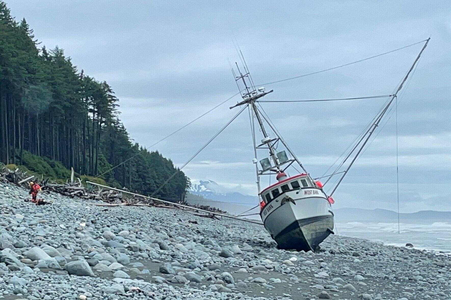 A Coast Guard aircrew fro Coast Guard Air Station Sitka rescued a boat’s captain after his vessel ran aground southeast of Yakutat on Thursday morning. (Courtesy photo / USCG)