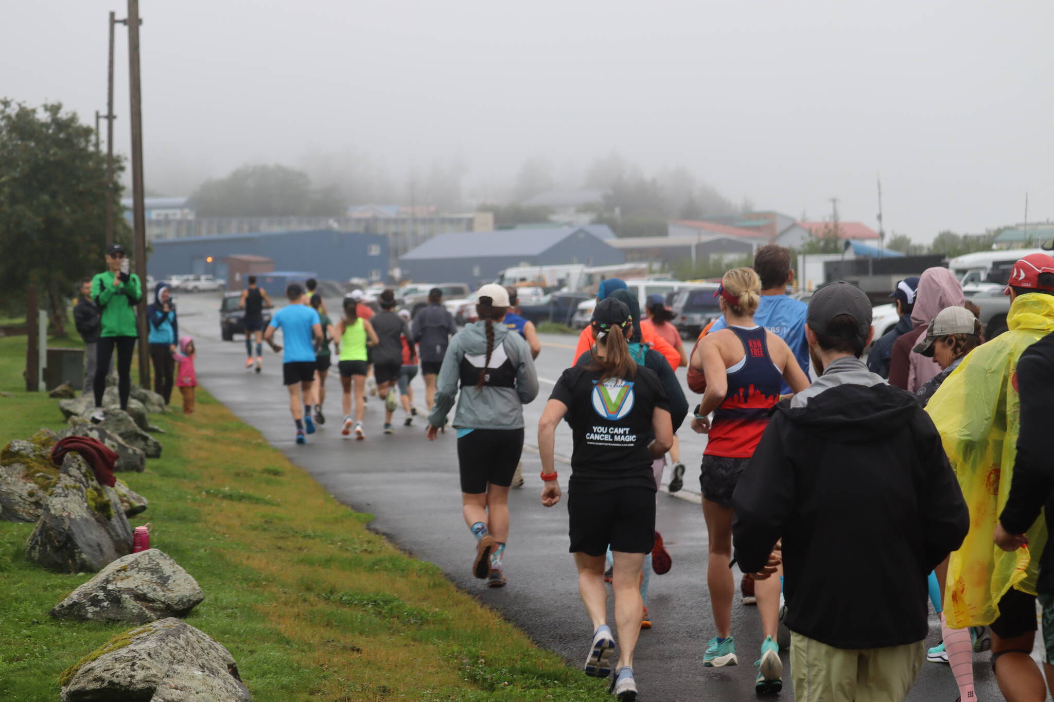 Runners for the 2022 Juneau Marathon started the race at Savikko Park on Douglas Island and ran an out-and-back course in light rain on Saturday morning. (Jonson Kuhn / Juneau Empire)