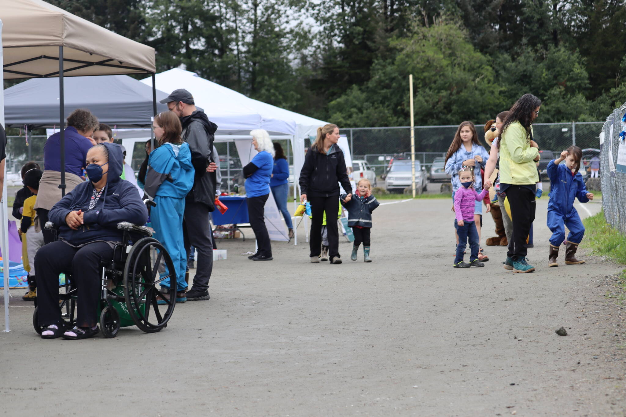 Many families came out to enjoy the fun and also visit with the various community agencies who had booths set up at the SAFE Child Advocacy Center’s first Family Day at the Park on Saturday at the Dimond Park Field House. (Jonson Kuhn / Juneau Empire)