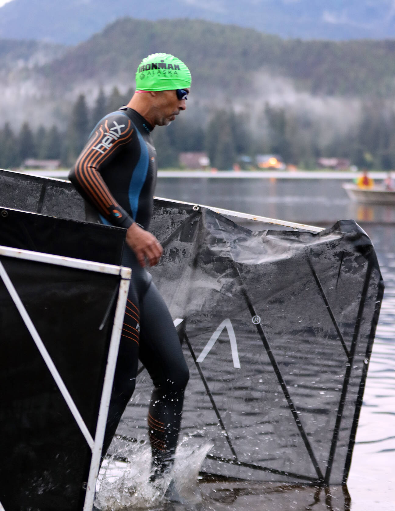 Ironman Alaska gets underway with the swimming leg of the popular endurance triathlon. (Ben Hohenstatt / Juneau Empire)