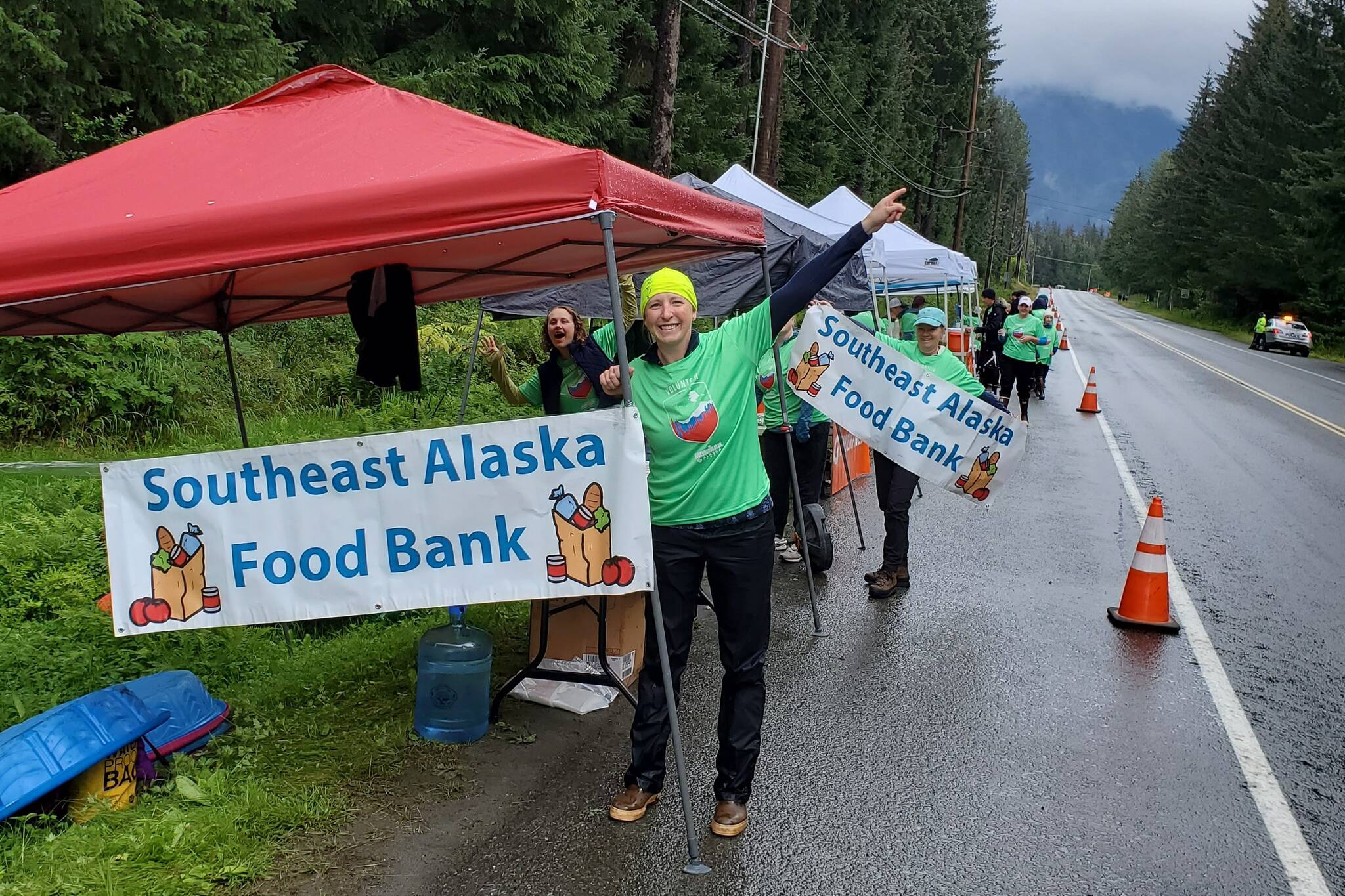 Southeast Alaska Food Bank board treasurer Buffy Pederson featured at aid station along with other volunteers for Sunday’s Ironman competition. (Courtesy photo / Chris Schapp)