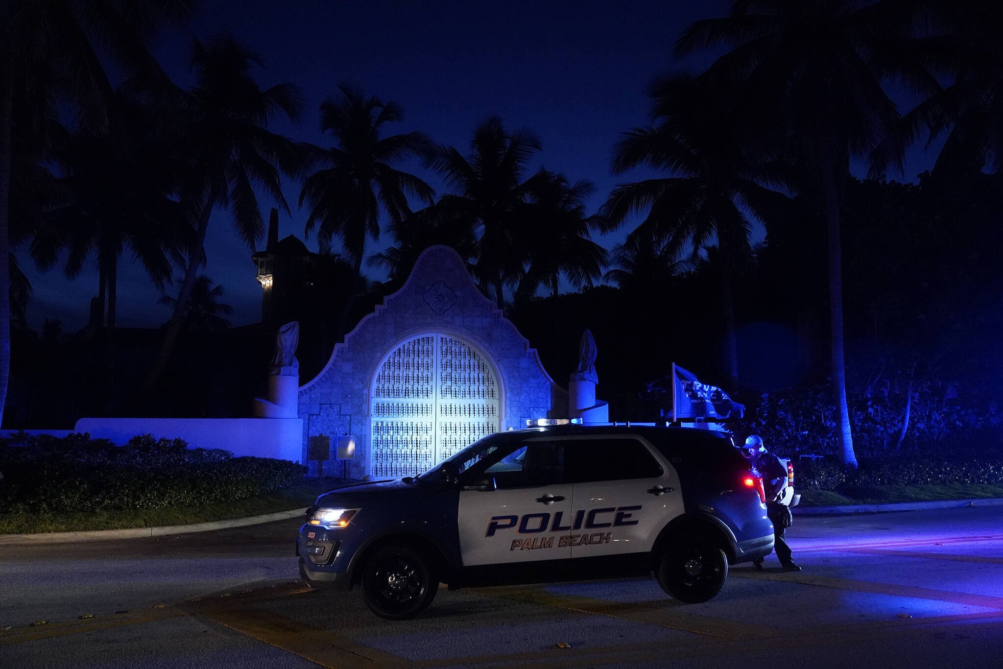 Police stand outside an entrance to former President Donald Trump’s Mar-a-Lago estate, Monday, Aug. 8, 2022, in Palm Beach, Fla. Trump said in a lengthy statement that the FBI was conducting a search of his Mar-a-Lago estate and asserted that agents had broken open a safe. (AP Photo / Wilfredo Lee)
