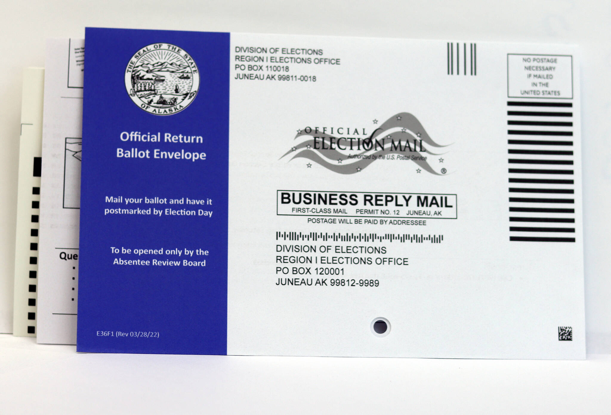 This May 2022 photo shows a ballot and return envelope in the state’s special primary election. Tuesday is Election Day for the general election featuring three of the top vote-getters from the earlier ballot. Aug. 16 will also include a regular primary election. Only the special election will feature ranked choice voting. (Ben Hohenstatt / Juneau Empire File)