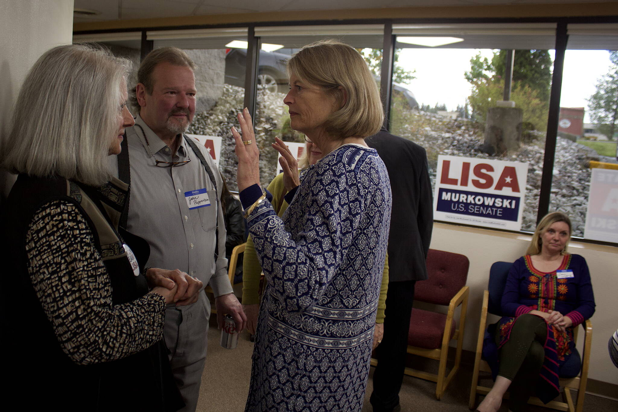 Mark Sabbatini / Juneau Empire 
U.S. Sen. Lisa Murkowski discusses her reelection campaign with supporters during the official opening of her Juneau campaign headquarters Thursday evening at Kootznoowoo Plaza.