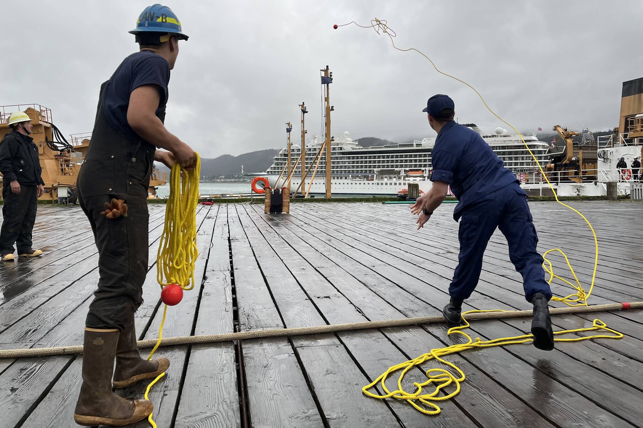 Team Fir competes in the line throw event which saw each crew member throwing a line across the deck to reach a target, simulating the real life process they undergo to save lives of anyone adrift in the water. (Jonson Kuhn / Juneau Empire)