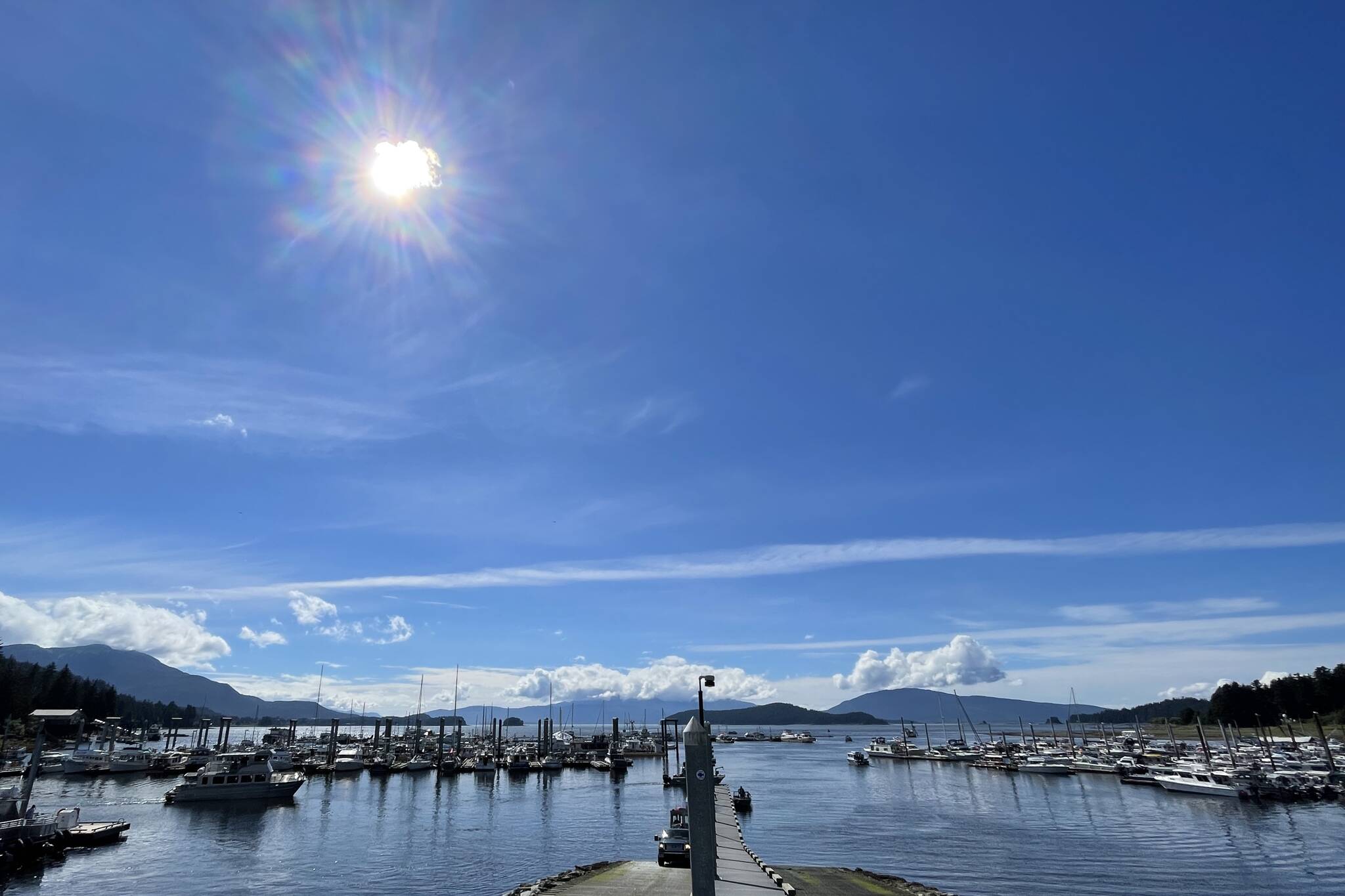 The sun shines over Auke Bay on Aug. 18 as a sunny weekend belies the coming autumn. (Michael S. Lockett / Juneau Empire)